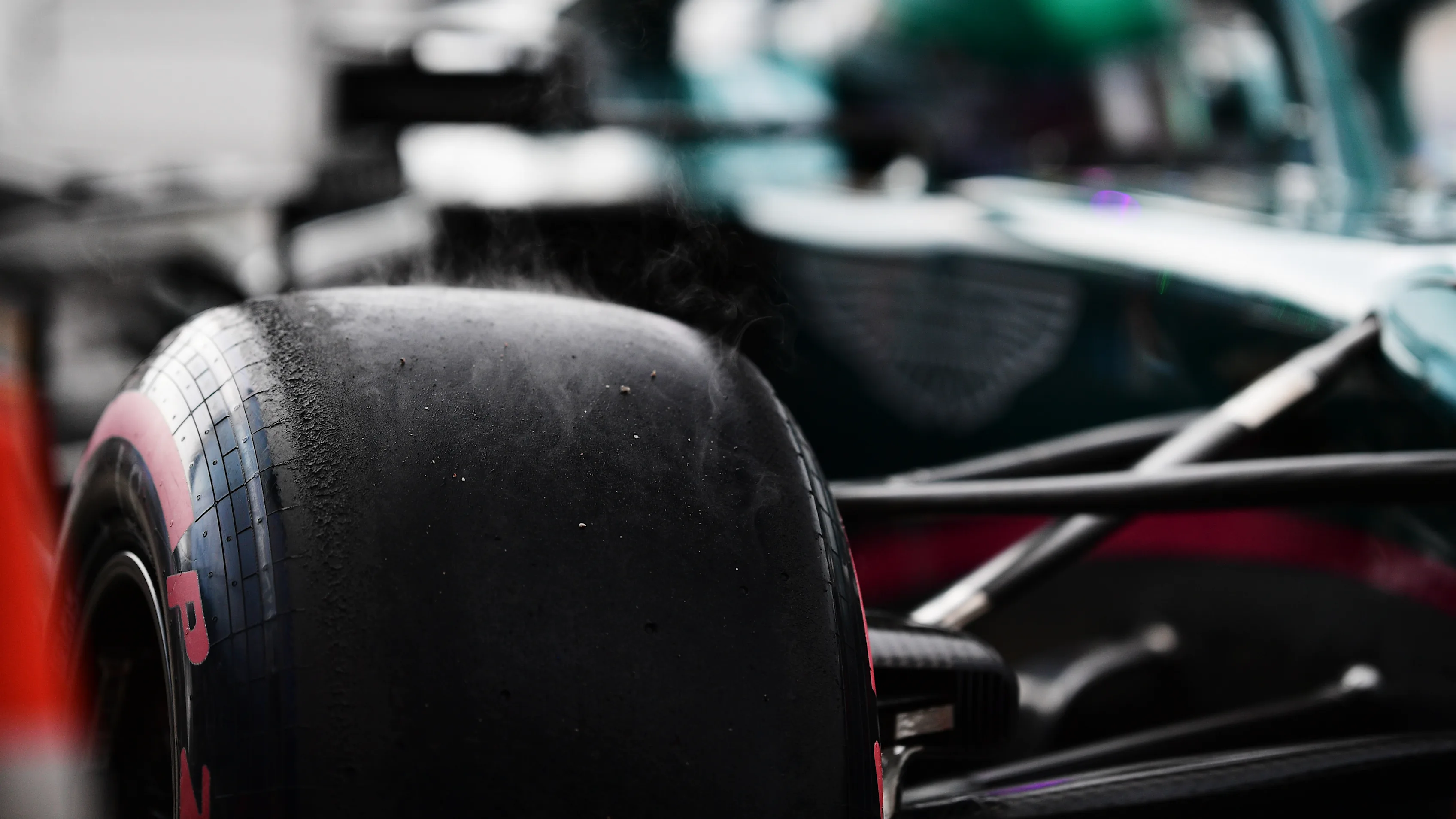 SOCHI, RUSSIA - SEPTEMBER 25: Steam pours off the tyre of Lance Stroll of Canada and Aston Martin F1 Team during qualifying ahead of the F1 Grand Prix of Russia at Sochi Autodrom on September 25, 2021 in Sochi, Russia. (Photo by Mario Renzi - Formula 1/Formula 1 via Getty Images)