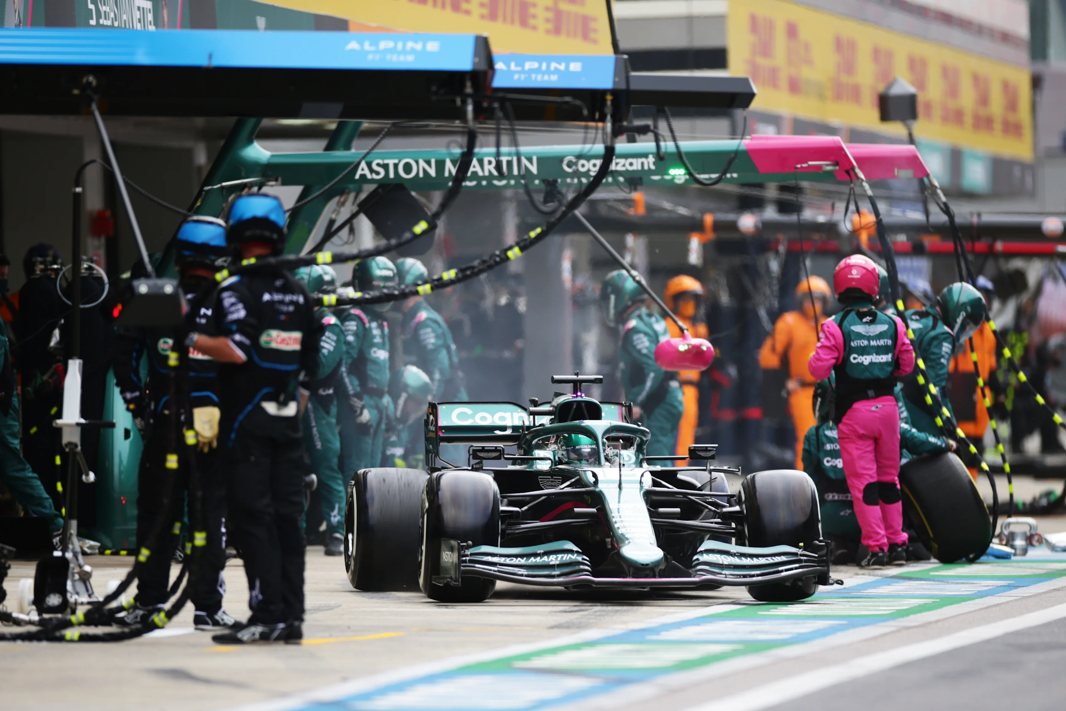 SOCHI, RUSSIA - SEPTEMBER 26: Lance Stroll of Canada driving the (18) Aston Martin AMR21 Mercedes makes a pitstop during the F1 Grand Prix of Russia at Sochi Autodrom on September 26, 2021 in Sochi, Russia. (Photo by Peter Fox/Getty Images)