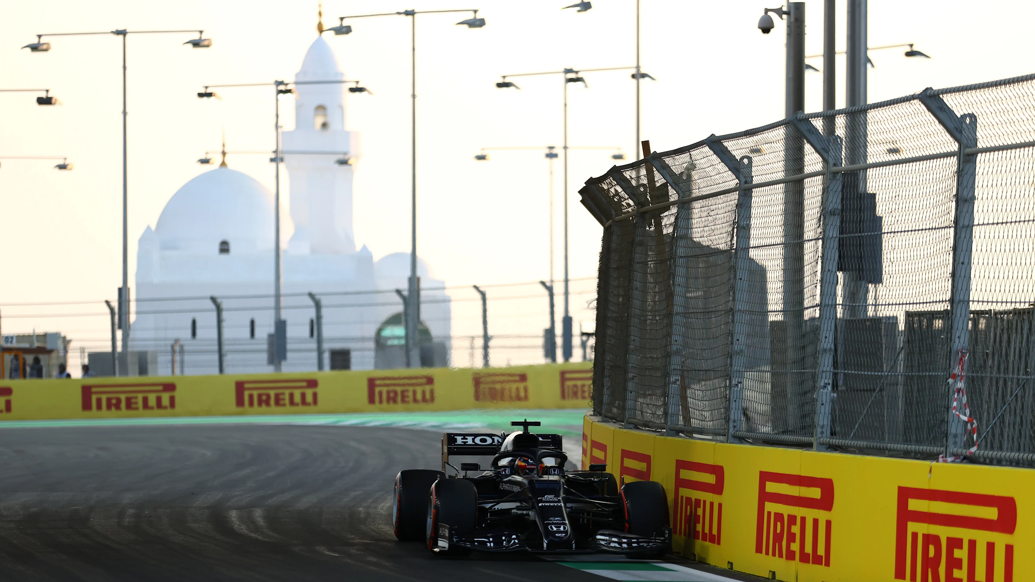 JEDDAH, SAUDI ARABIA - DECEMBER 03: Yuki Tsunoda of Japan driving the (22) Scuderia AlphaTauri AT02 Honda during practice ahead of the F1 Grand Prix of Saudi Arabia at Jeddah Corniche Circuit on December 03, 2021 in Jeddah, Saudi Arabia. (Photo by Bryn Lennon - Formula 1/Formula 1 via Getty Images)