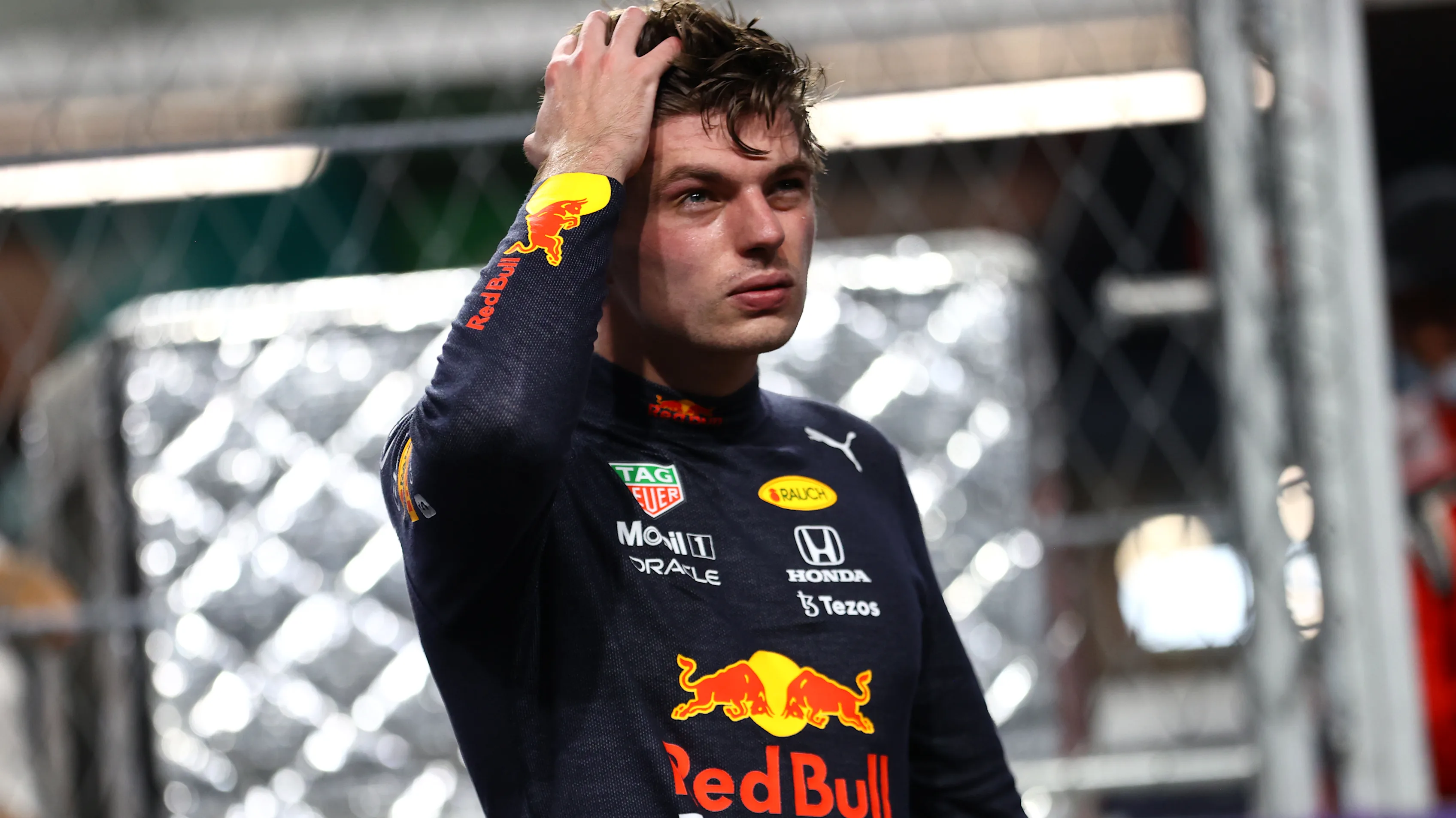 JEDDAH, SAUDI ARABIA - DECEMBER 04: Third place qualifier Max Verstappen of Netherlands and Red Bull Racing looks on in parc ferme during qualifying ahead of the F1 Grand Prix of Saudi Arabia at Jeddah Corniche Circuit on December 04, 2021 in Jeddah, Saudi Arabia. (Photo by Bryn Lennon - Formula 1/Formula 1 via Getty Images)