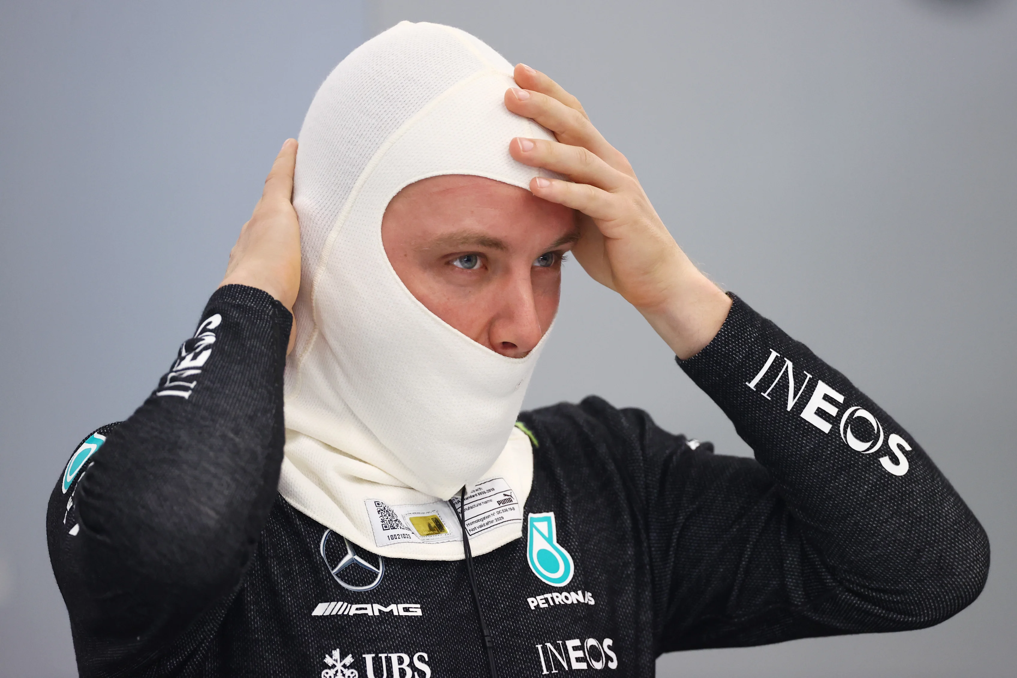 JEDDAH, SAUDI ARABIA - DECEMBER 04: Valtteri Bottas of Finland and Mercedes GP prepares to drive in the garage during final practice ahead of the F1 Grand Prix of Saudi Arabia at Jeddah Corniche Circuit on December 04, 2021 in Jeddah, Saudi Arabia. (Photo by Bryn Lennon - Formula 1/Formula 1 via Getty Images)