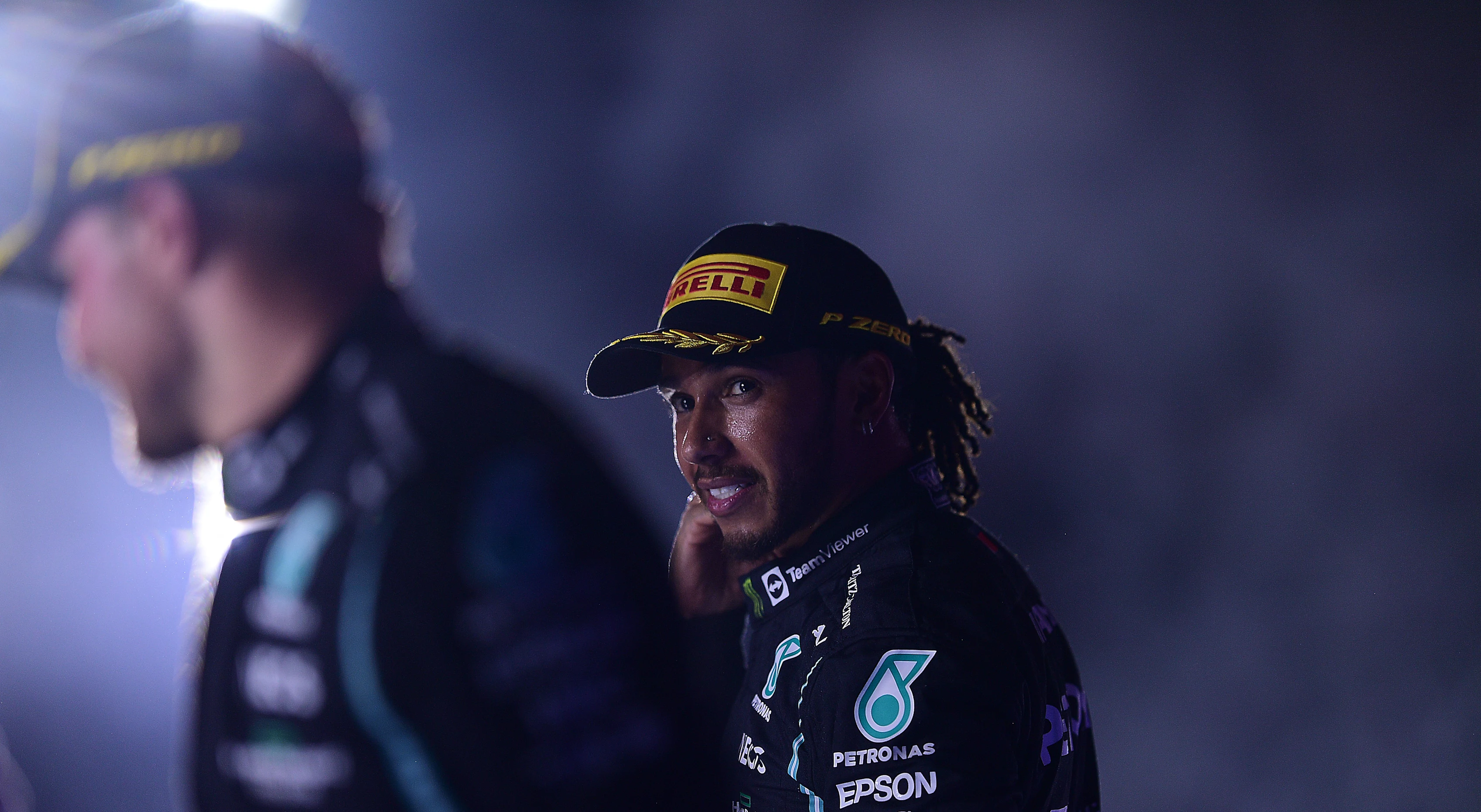 JEDDAH, SAUDI ARABIA - DECEMBER 05: Race winner Lewis Hamilton of Great Britain and Mercedes GP celebrates on the podium during the F1 Grand Prix of Saudi Arabia at Jeddah Corniche Circuit on December 05, 2021 in Jeddah, Saudi Arabia. (Photo by Mario Renzi - Formula 1/Formula 1 via Getty Images)