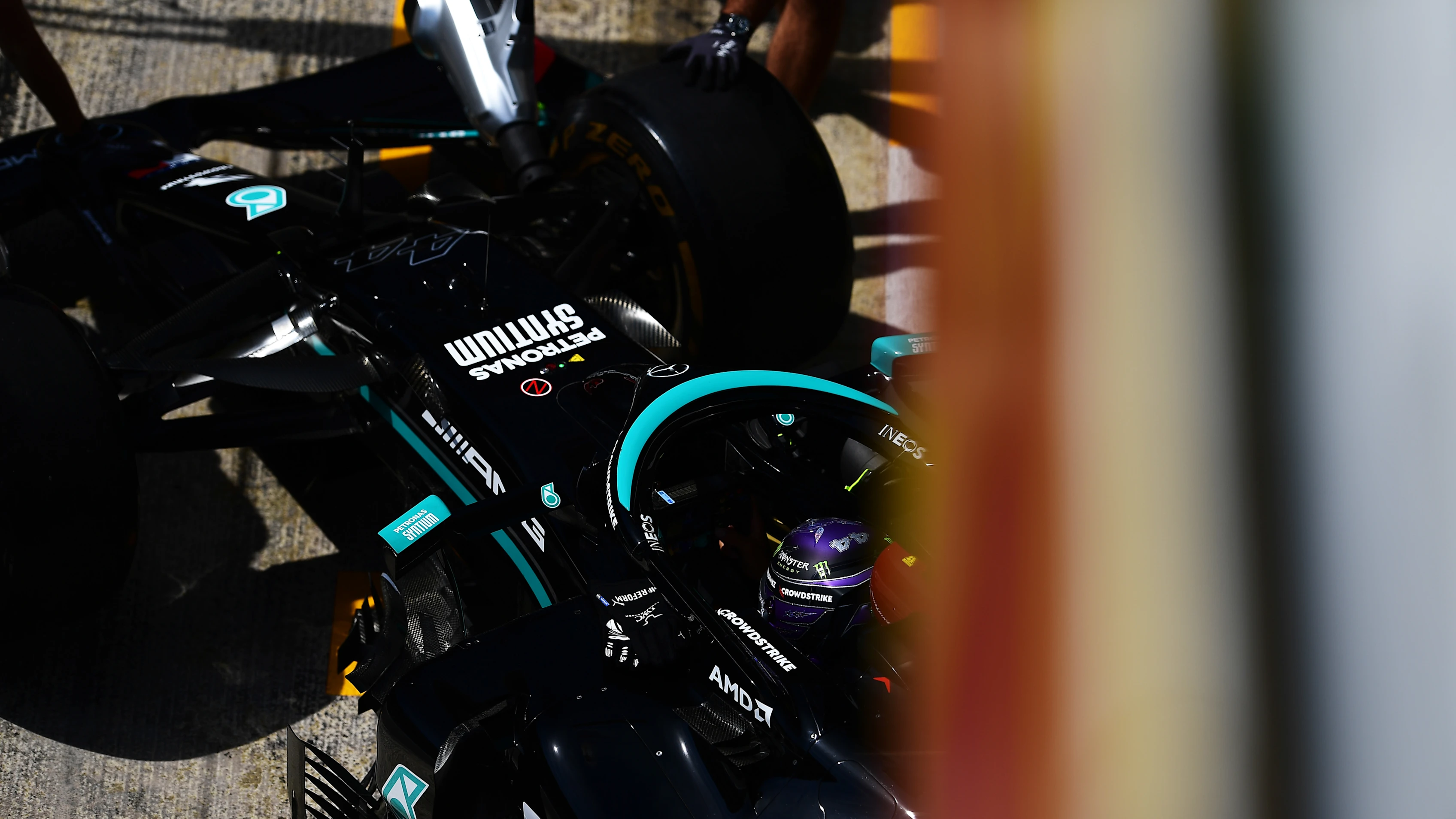 BARCELONA, SPAIN - MAY 07: Lewis Hamilton of Great Britain driving the (44) Mercedes AMG Petronas F1 Team Mercedes W12 is pushed into the garage during practice for the F1 Grand Prix of Spain at Circuit de Barcelona-Catalunya on May 07, 2021 in Barcelona, Spain. (Photo by Mario Renzi - Formula 1/Formula 1 via Getty Images)