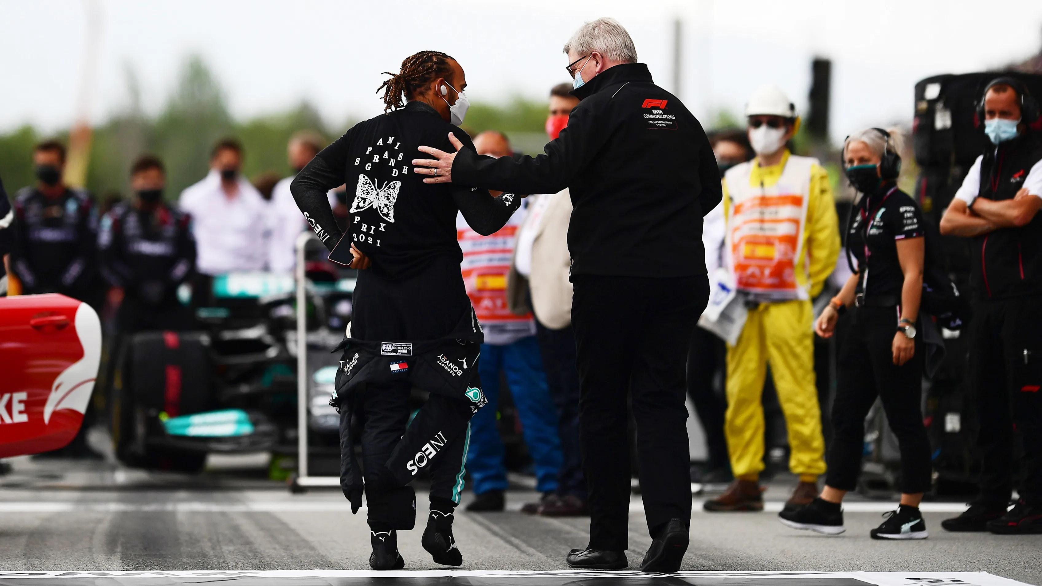 BARCELONA, SPAIN - MAY 09: Lewis Hamilton of Great Britain and Mercedes GP interacts with Ross