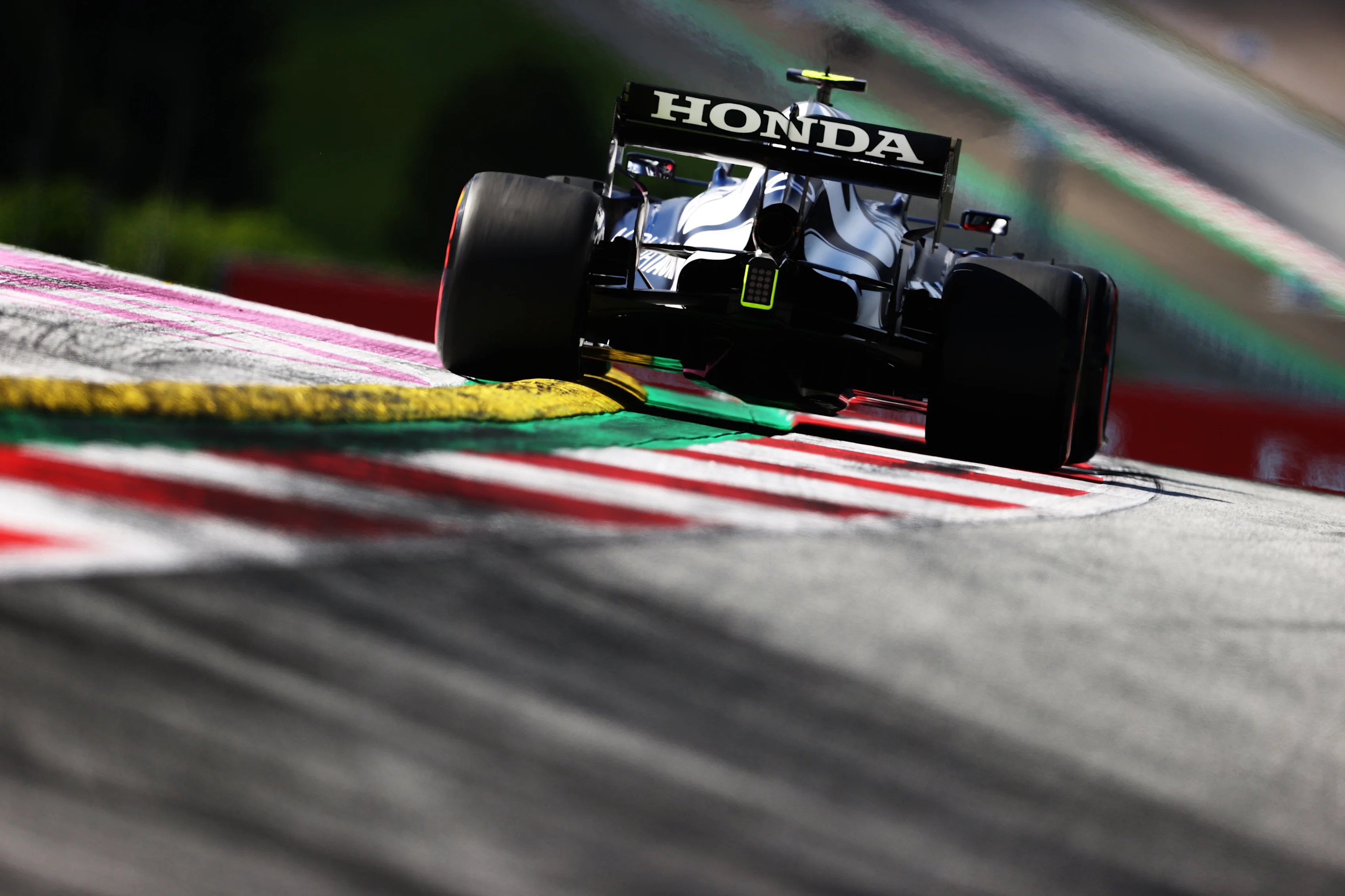 SPIELBERG, AUSTRIA - JUNE 26: Pierre Gasly of France driving the (10) Scuderia AlphaTauri AT02 Honda on track during qualifying ahead of the F1 Grand Prix of Styria at Red Bull Ring on June 26, 2021 in Spielberg, Austria. (Photo by Clive Rose/Getty Images)