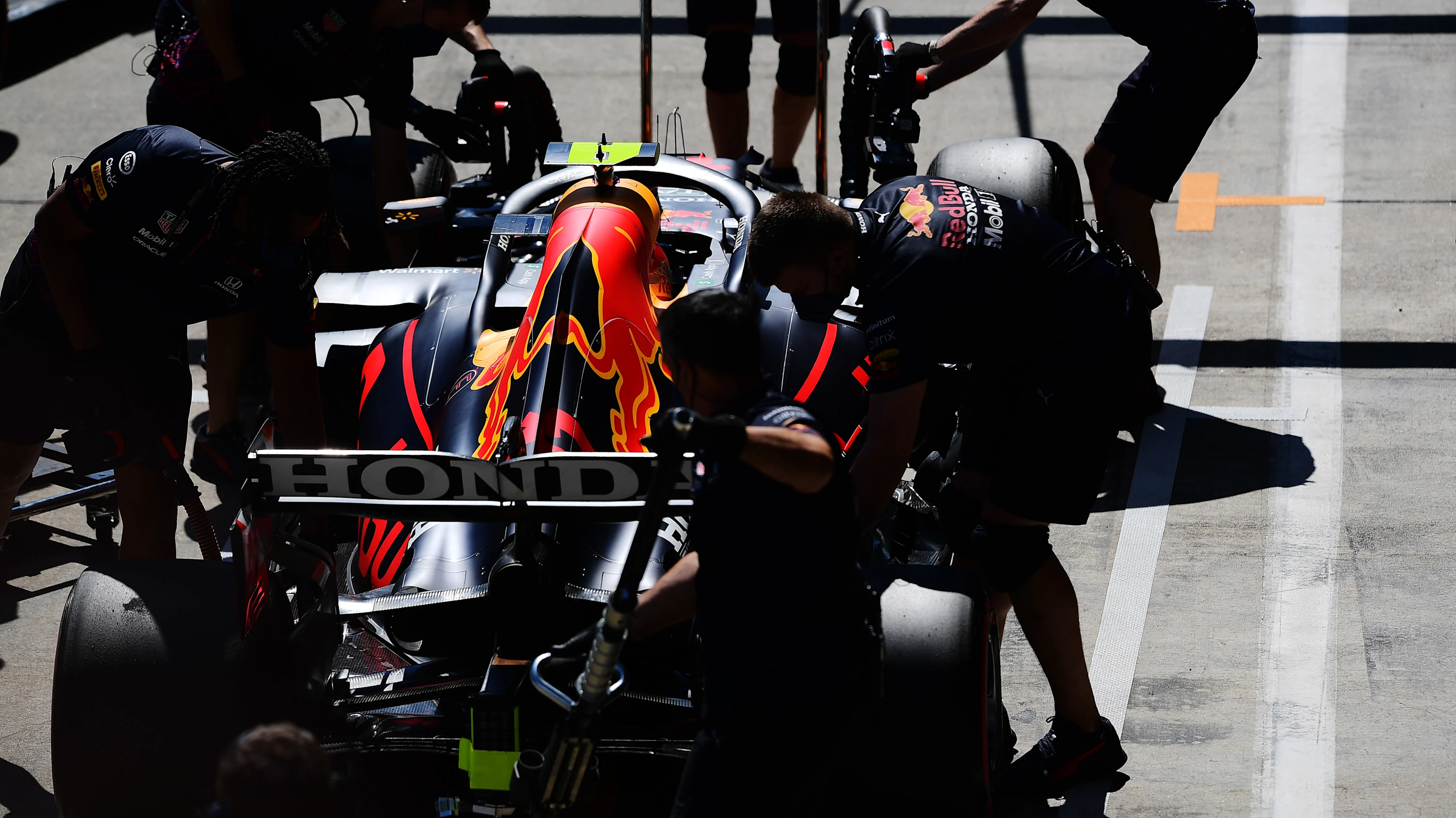 SPIELBERG, AUSTRIA - JUNE 26: Sergio Perez of Mexico driving the (11) Red Bull Racing RB16B Honda stops in the Pitlane during qualifying ahead of the F1 Grand Prix of Styria at Red Bull Ring on June 26, 2021 in Spielberg, Austria. (Photo by Mario Renzi - Formula 1/Formula 1 via Getty Images)