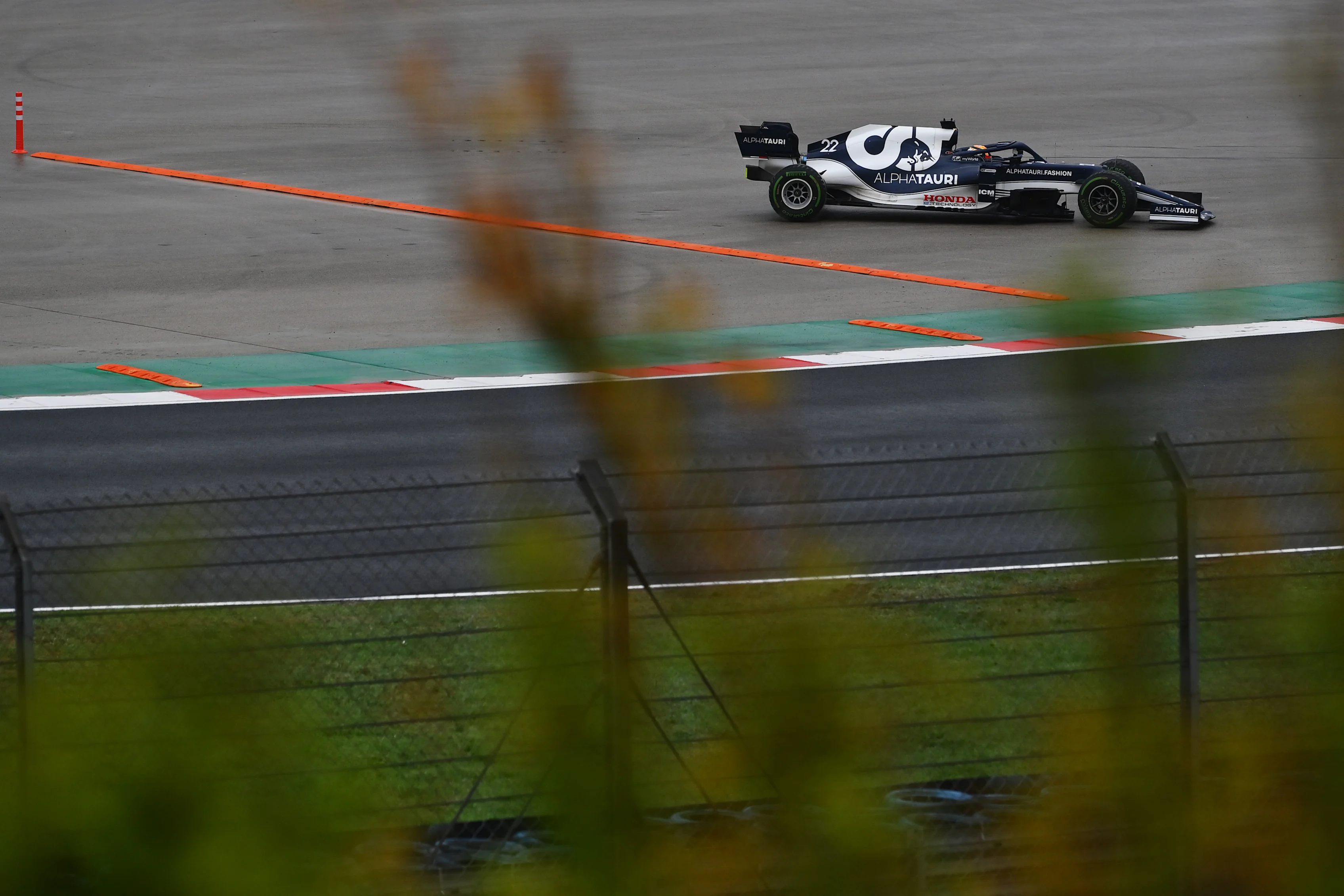 ISTANBUL, TURKEY - OCTOBER 10: Yuki Tsunoda of Japan driving the (22) Scuderia AlphaTauri AT02 Honda runs wide during the F1 Grand Prix of Turkey at Intercity Istanbul Park on October 10, 2021 in Istanbul, Turkey. (Photo by Dan Mullan/Getty Images)