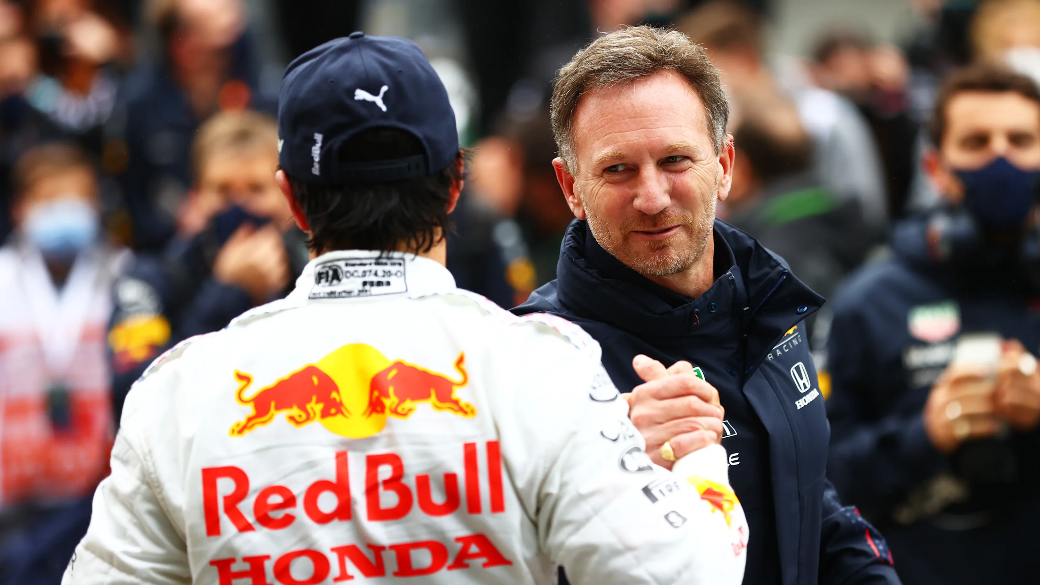 ISTANBUL, TURKEY - OCTOBER 10: Third placed Sergio Perez of Mexico and Red Bull Racing and Red Bull