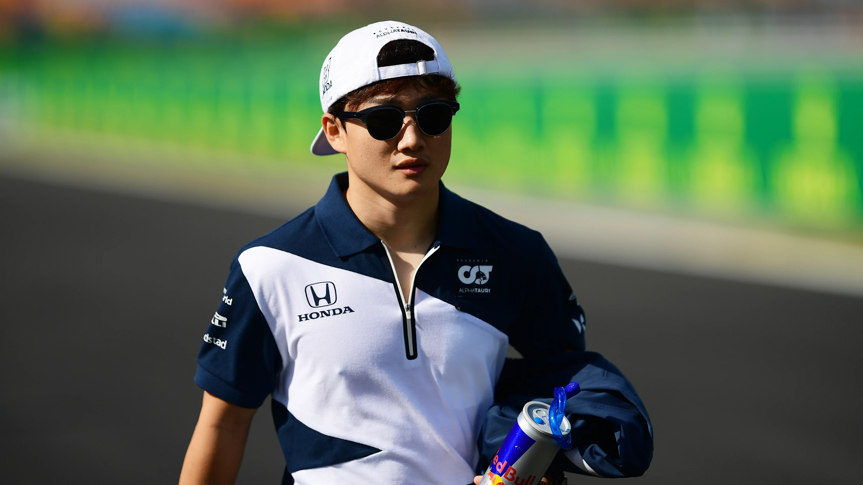 ISTANBUL, TURKEY - OCTOBER 07: Yuki Tsunoda of Japan and Scuderia AlphaTauri walks the track during