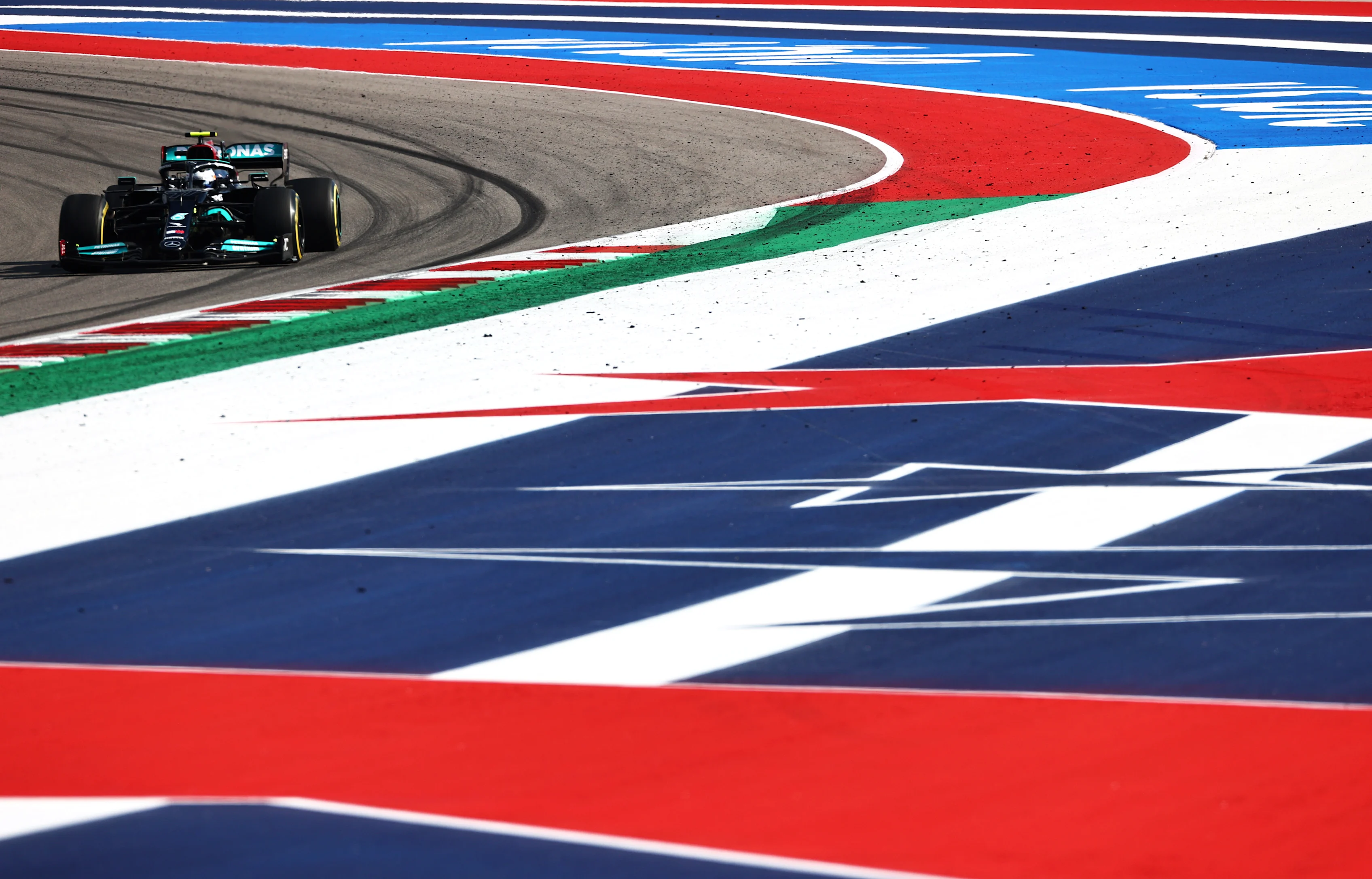 AUSTIN, TEXAS - OCTOBER 22: Valtteri Bottas of Finland driving the (77) Mercedes AMG Petronas F1 Team Mercedes W12 during practice ahead of the F1 Grand Prix of USA at Circuit of The Americas on October 22, 2021 in Austin, Texas. (Photo by Mark Thompson/Getty Images)