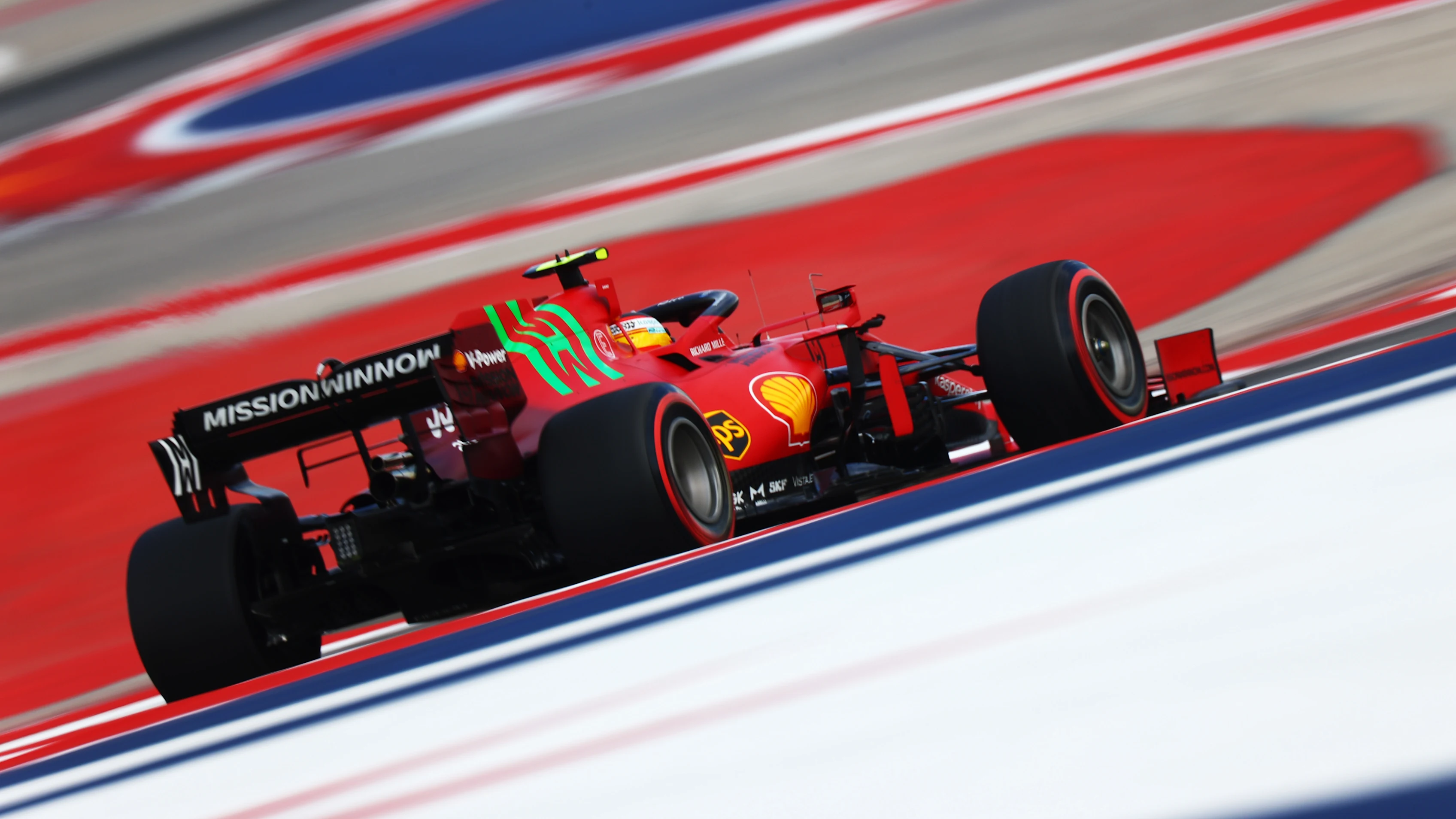AUSTIN, TEXAS - OCTOBER 23: Carlos Sainz of Spain driving the (55) Scuderia Ferrari SF21 during