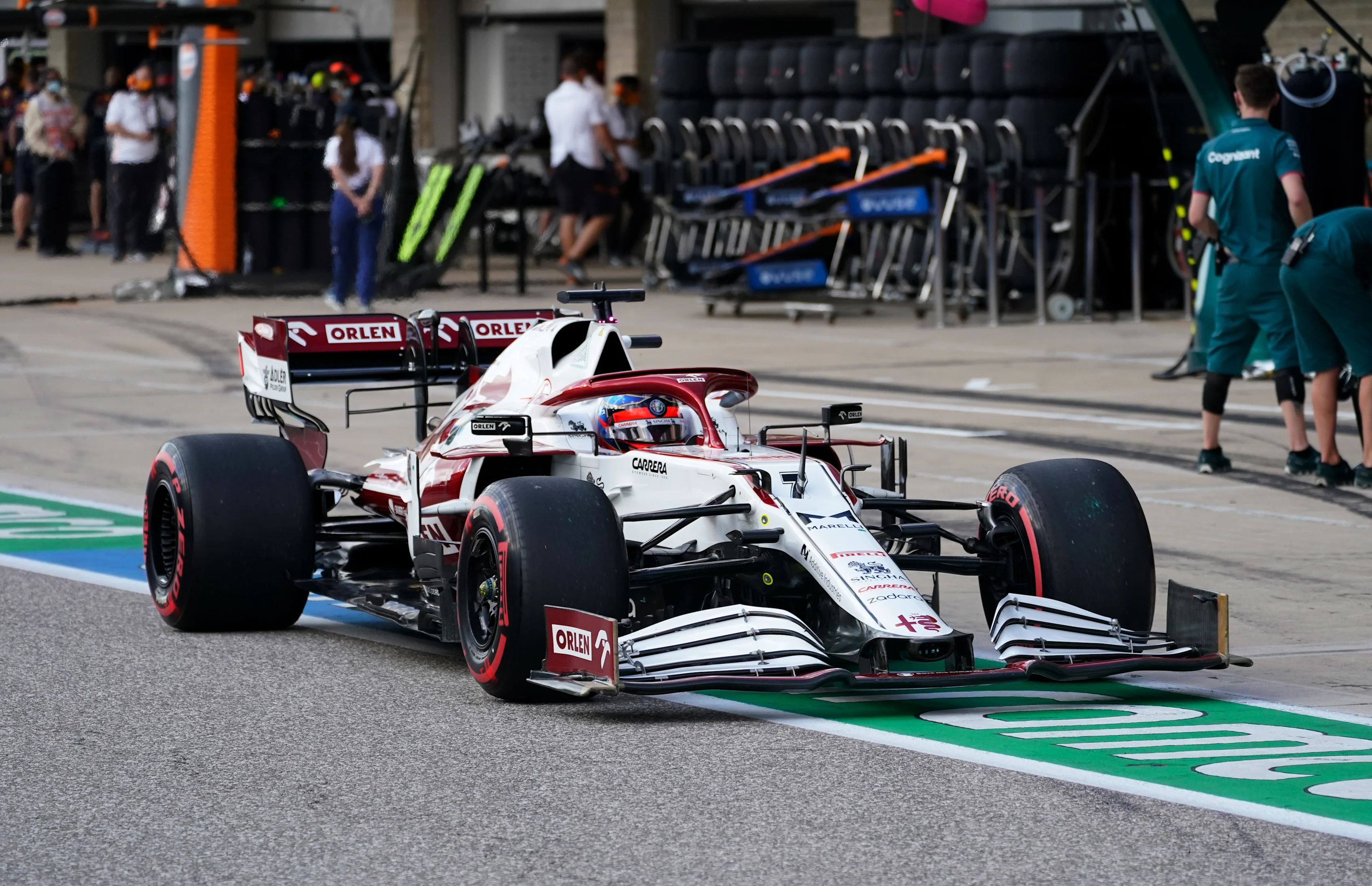 AUSTIN, TEXAS - OCTOBER 23: Kimi Raikkonen of Finland driving the (7) Alfa Romeo Racing C41 Ferrari in the Pitlane during qualifying ahead of the F1 Grand Prix of USA at Circuit of The Americas on October 23, 2021 in Austin, Texas. (Photo by Darron Cummings - Pool/Getty Images)