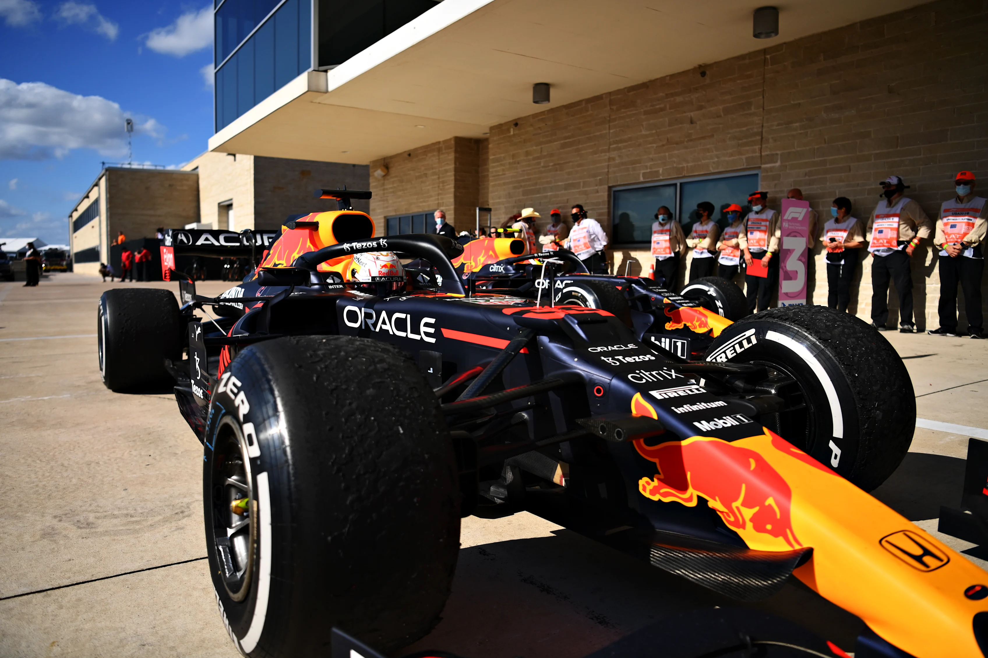 AUSTIN, TEXAS - OCTOBER 24: Race winner Max Verstappen of Netherlands and Red Bull Racing stops in