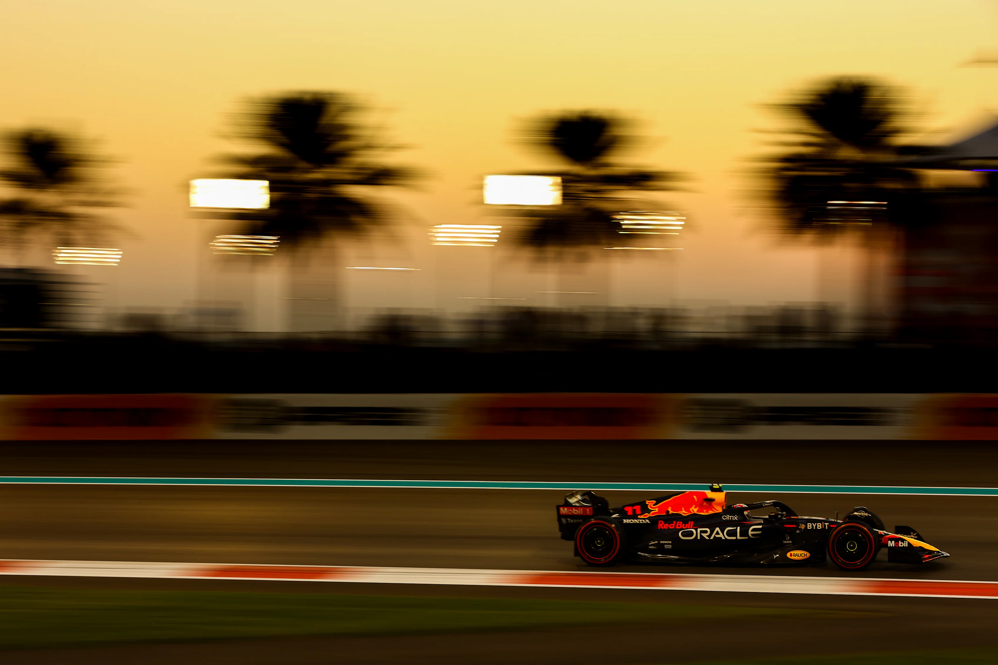 ABU DHABI, UNITED ARAB EMIRATES - NOVEMBER 18: Sergio Perez of Mexico driving the (11) Oracle Red