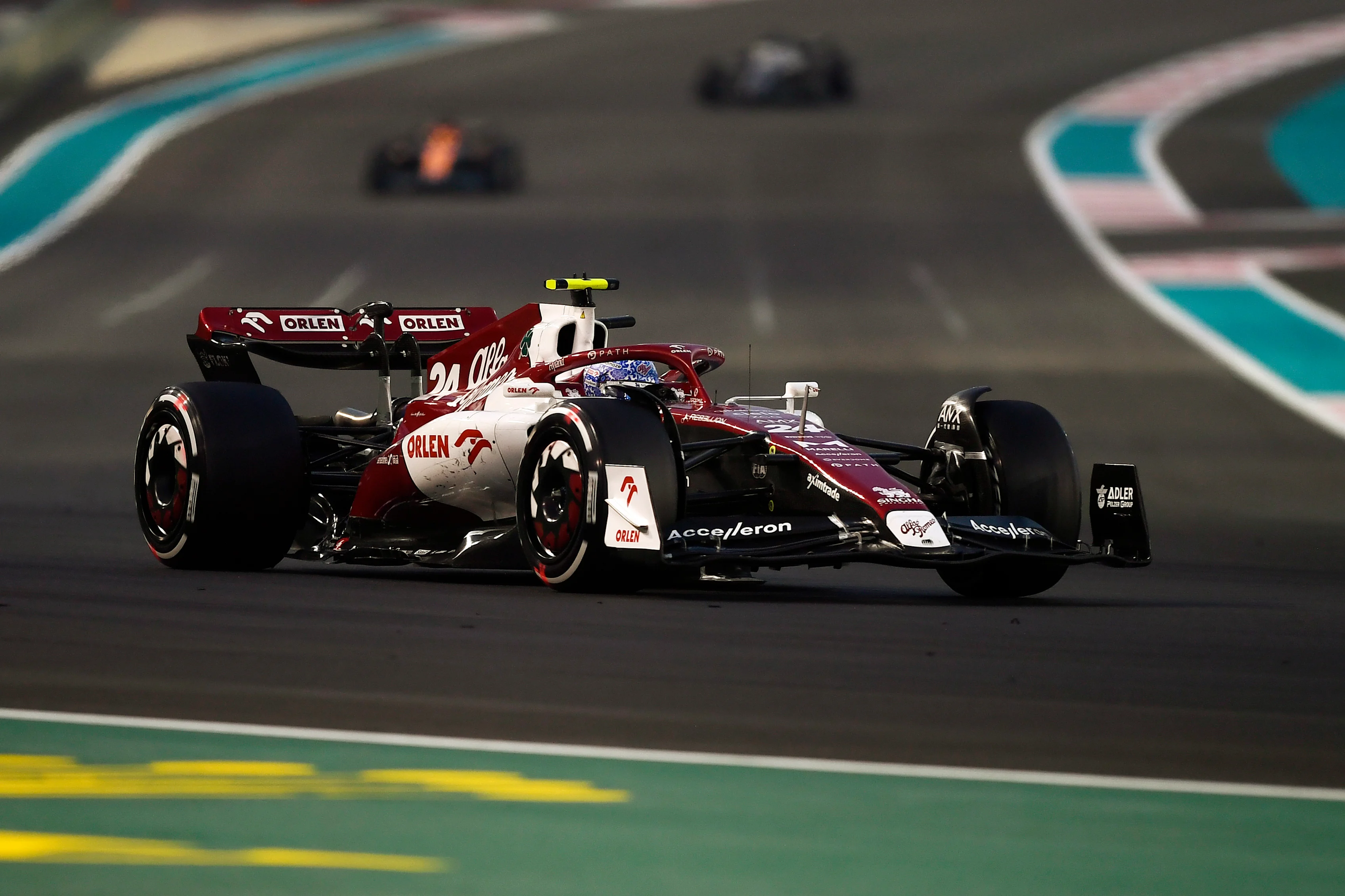 ABU DHABI, UNITED ARAB EMIRATES - NOVEMBER 20: Zhou Guanyu of China driving the (24) Alfa Romeo F1 C42 Ferrari on track during the F1 Grand Prix of Abu Dhabi at Yas Marina Circuit on November 20, 2022 in Abu Dhabi, United Arab Emirates. (Photo by Rudy Carezzevoli/Getty Images)