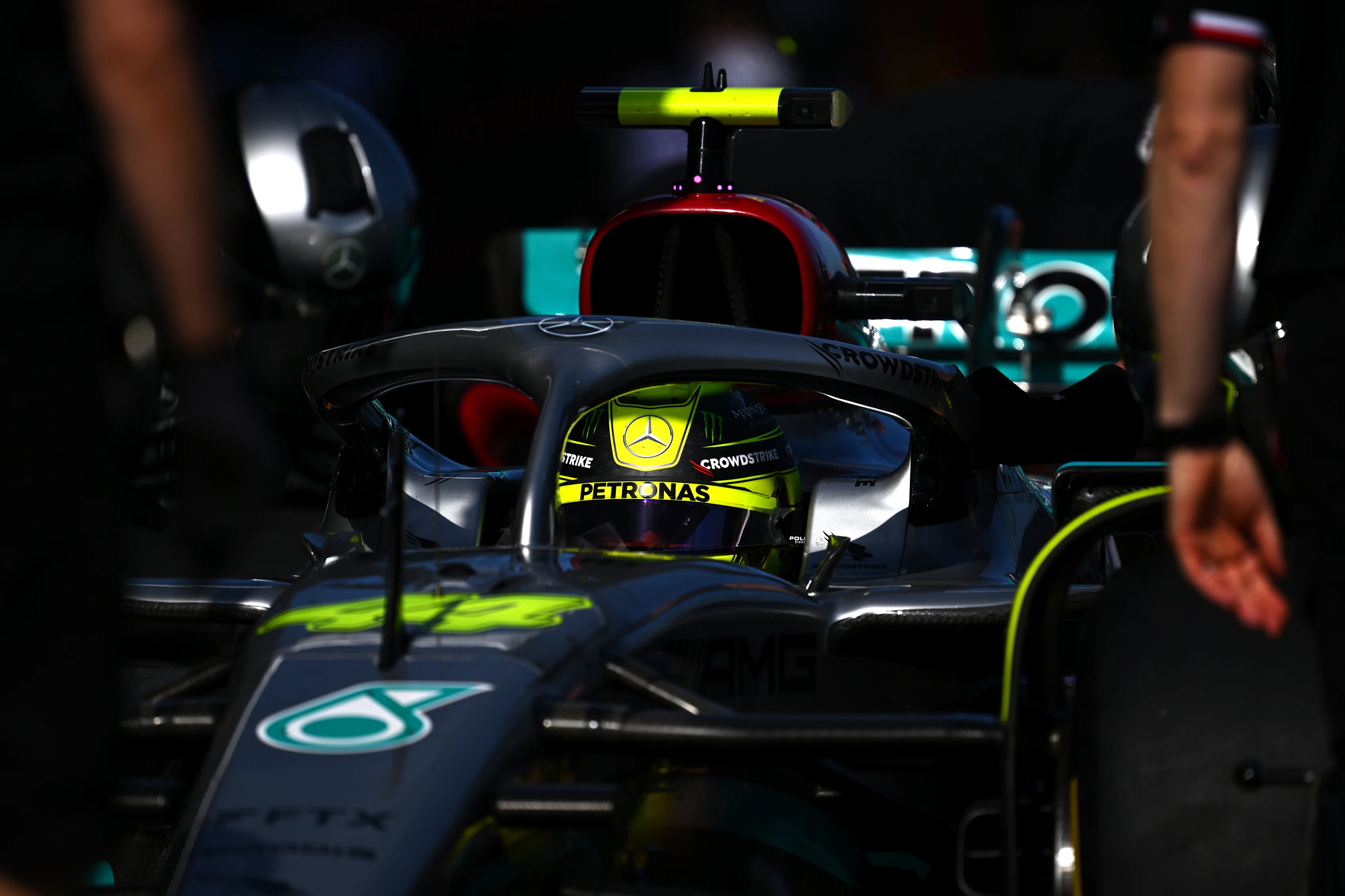 MELBOURNE, AUSTRALIA - APRIL 08: Lewis Hamilton of Great Britain driving the (44) Mercedes AMG Petronas F1 Team W13 stops in the Pitlane during practice ahead of the F1 Grand Prix of Australia at Melbourne Grand Prix Circuit on April 08, 2022 in Melbourne, Australia. (Photo by Clive Mason/Getty Images)