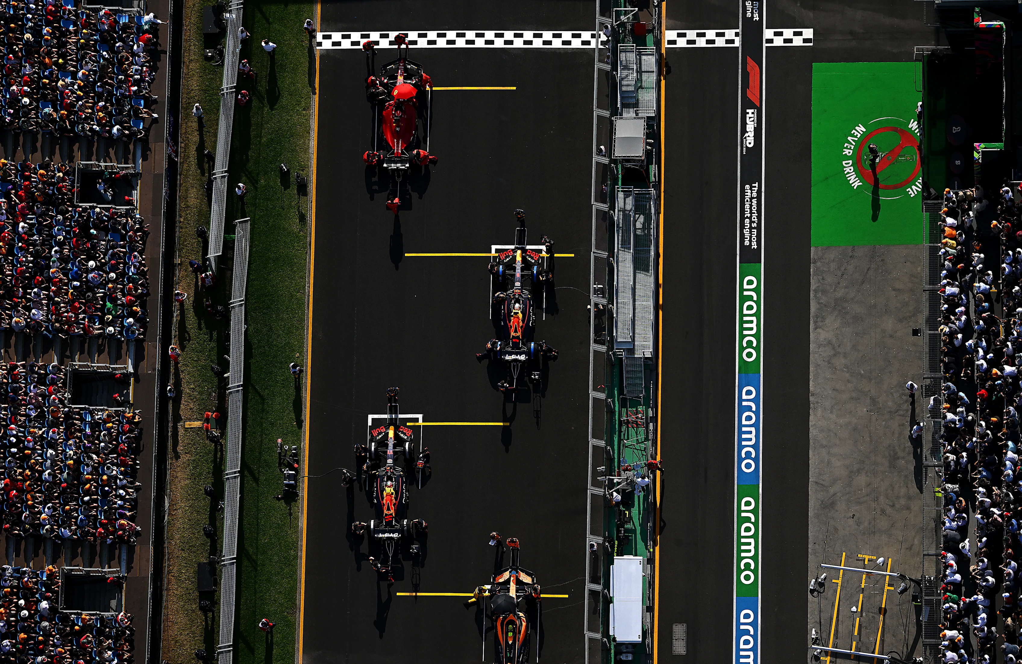 MELBOURNE, AUSTRALIA - APRIL 10: Charles Leclerc of Monaco and Ferrari, Max Verstappen of the
