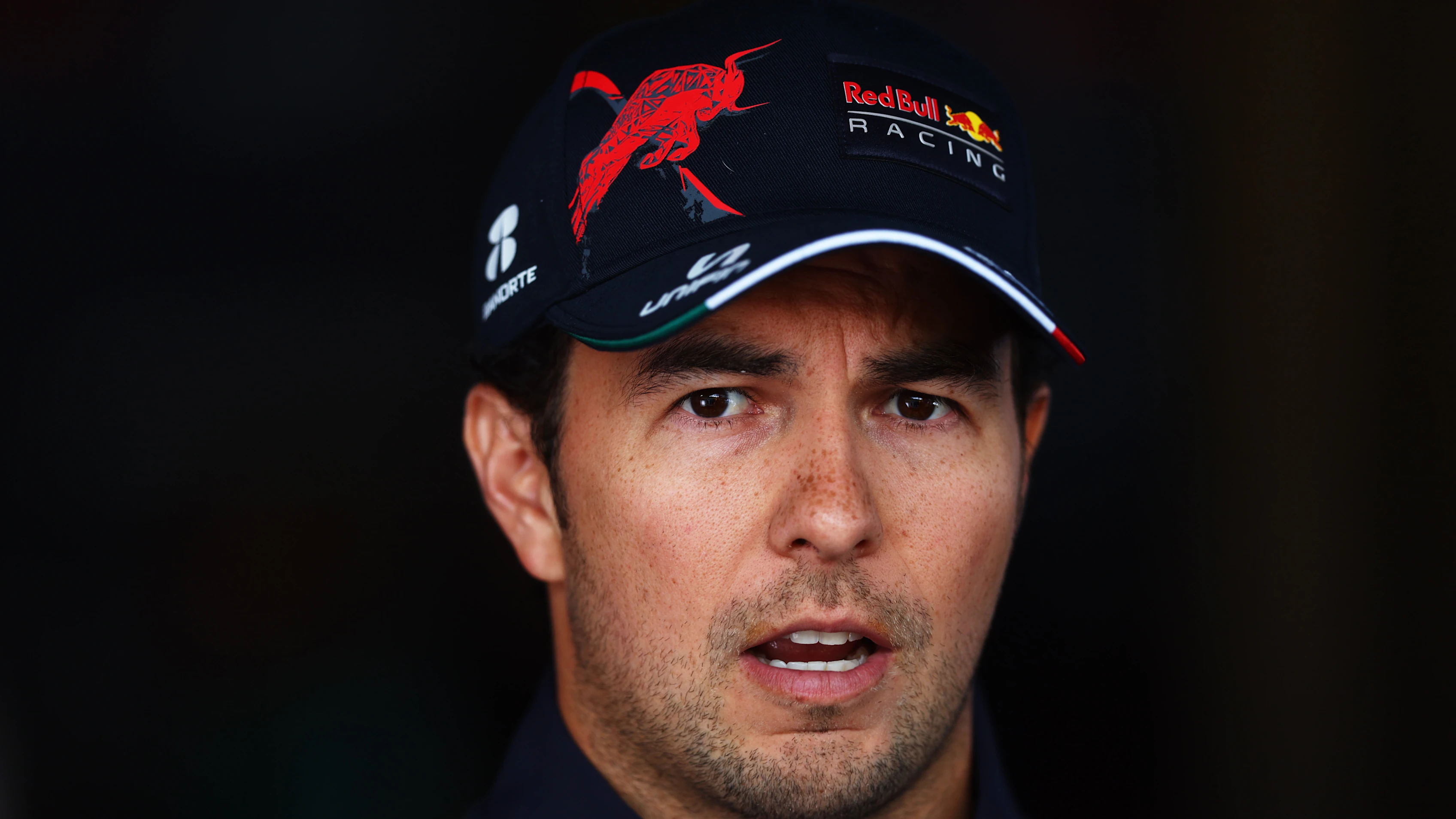 SPIELBERG, AUSTRIA - JULY 07: Sergio Perez of Mexico and Oracle Red Bull Racing talks to the media