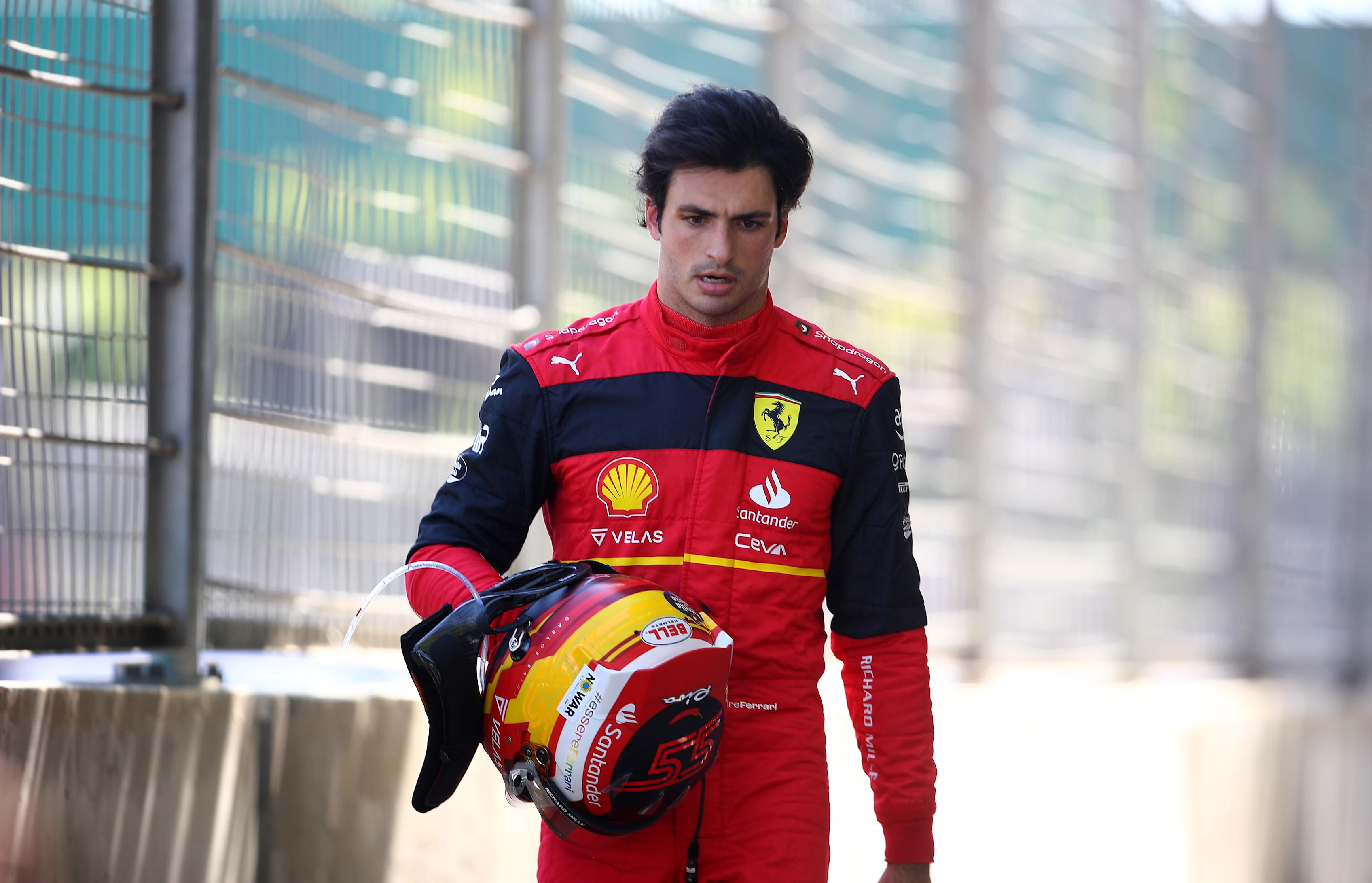 BAKU, AZERBAIJAN - JUNE 12: Carlos Sainz of Spain and Ferrari looks dejected after retiring from the race during the F1 Grand Prix of Azerbaijan at Baku City Circuit on June 12, 2022 in Baku, Azerbaijan. (Photo by Joe Portlock - Formula 1/Formula 1 via Getty Images)