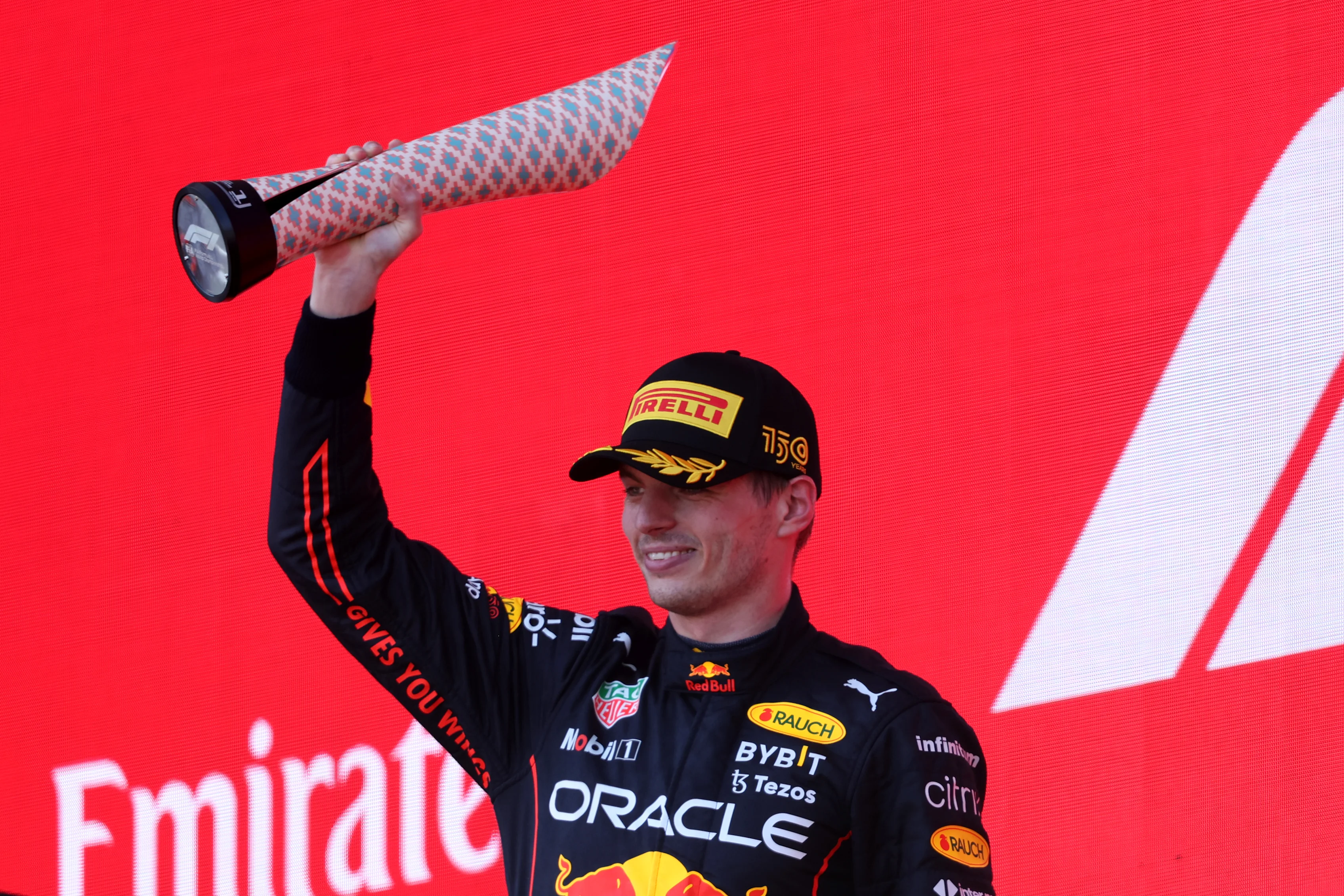 BAKU, AZERBAIJAN - JUNE 12: Race winner Max Verstappen of the Netherlands and Oracle Red Bull Racing celebrates on the podium during the F1 Grand Prix of Azerbaijan at Baku City Circuit on June 12, 2022 in Baku, Azerbaijan. (Photo by Bryn Lennon - Formula 1/Formula 1 via Getty Images)
