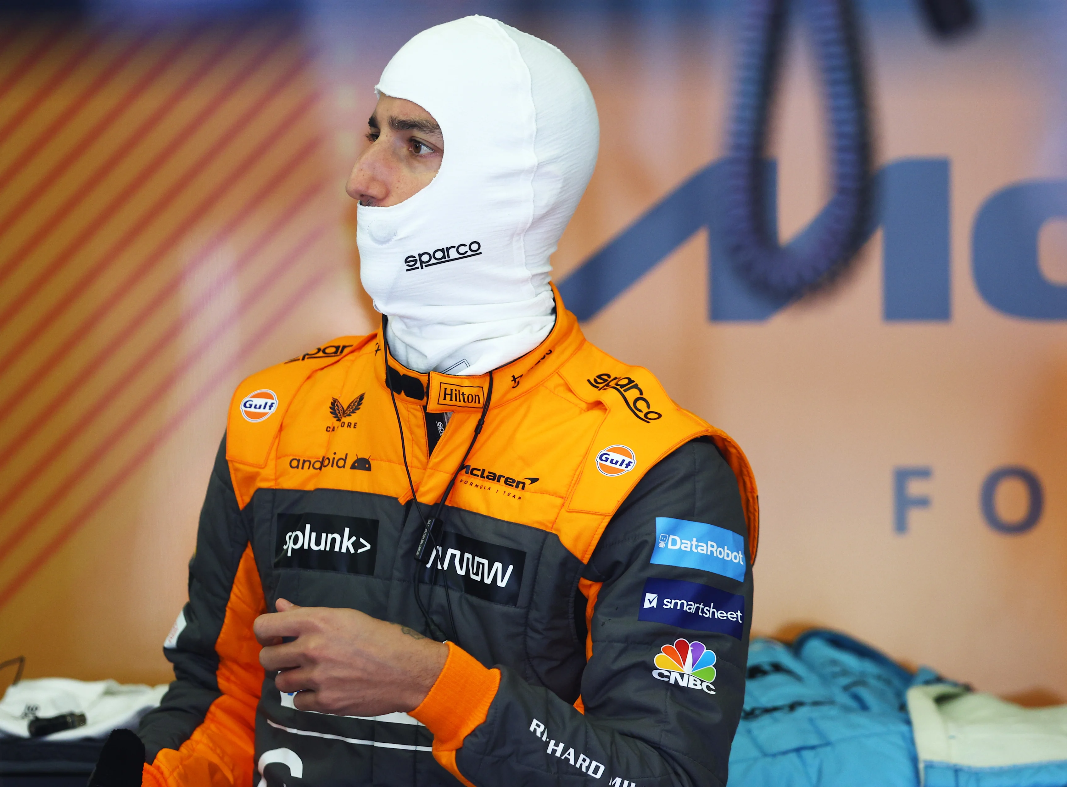 BAHRAIN, BAHRAIN - MARCH 18: Daniel Ricciardo of Australia and McLaren prepares to drive in the garage during practice ahead of the F1 Grand Prix of Bahrain at Bahrain International Circuit on March 18, 2022 in Bahrain, Bahrain. (Photo by Lars Baron/Getty Images)