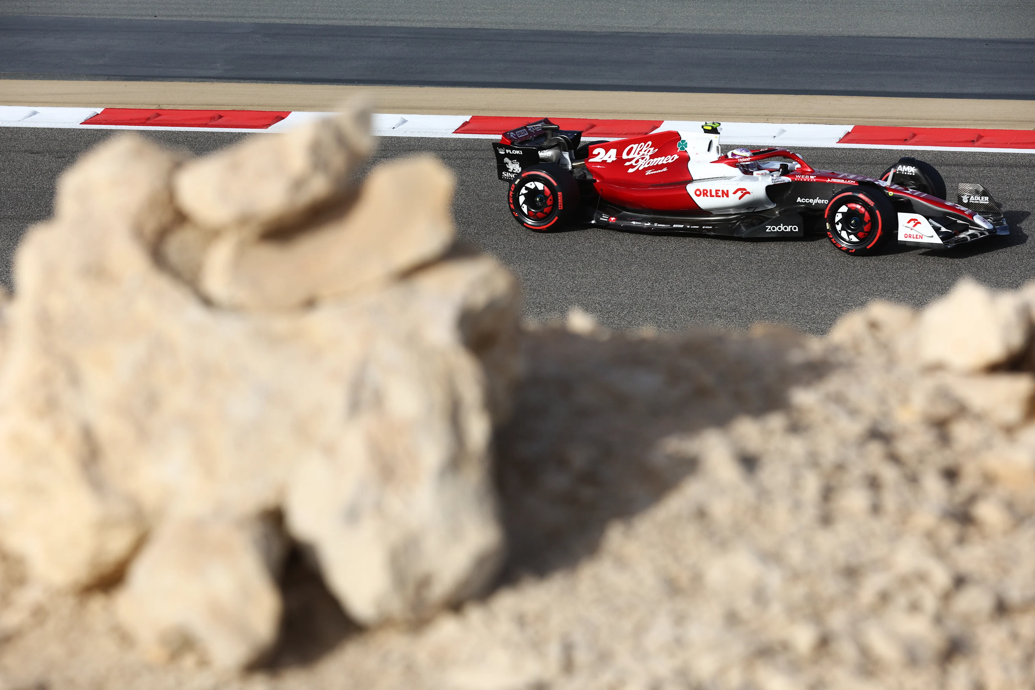 BAHRAIN, BAHRAIN - MARCH 18: Zhou Guanyu of China driving the (24) Alfa Romeo F1 C42 Ferrari on track during practice ahead of the F1 Grand Prix of Bahrain at Bahrain International Circuit on March 18, 2022 in Bahrain, Bahrain. (Photo by Clive Rose - Formula 1/Formula 1 via Getty Images)