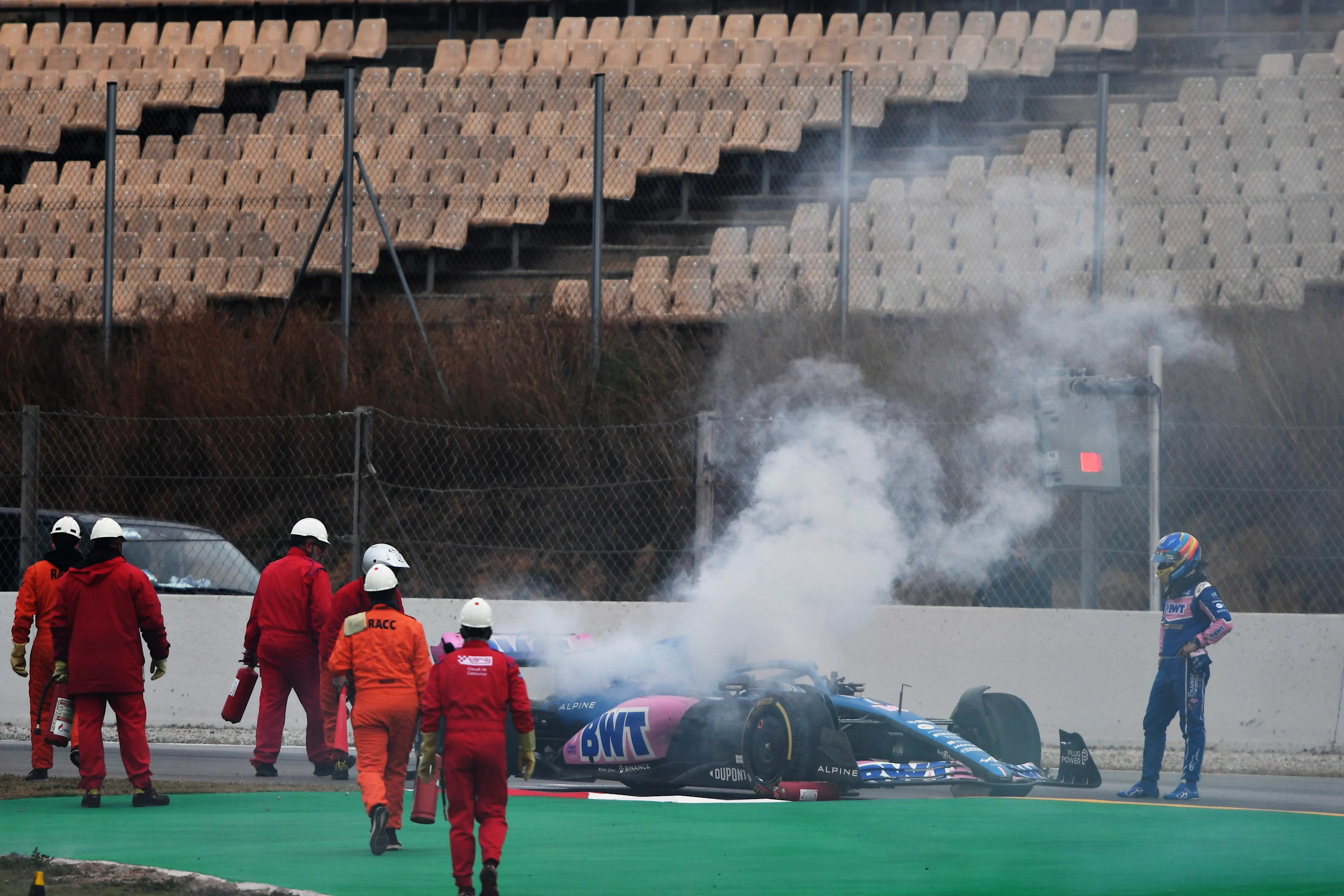 BARCELONA, SPAIN - FEBRUARY 25: Fernando Alonso of Spain and Alpine F1 looks on after stopping on
