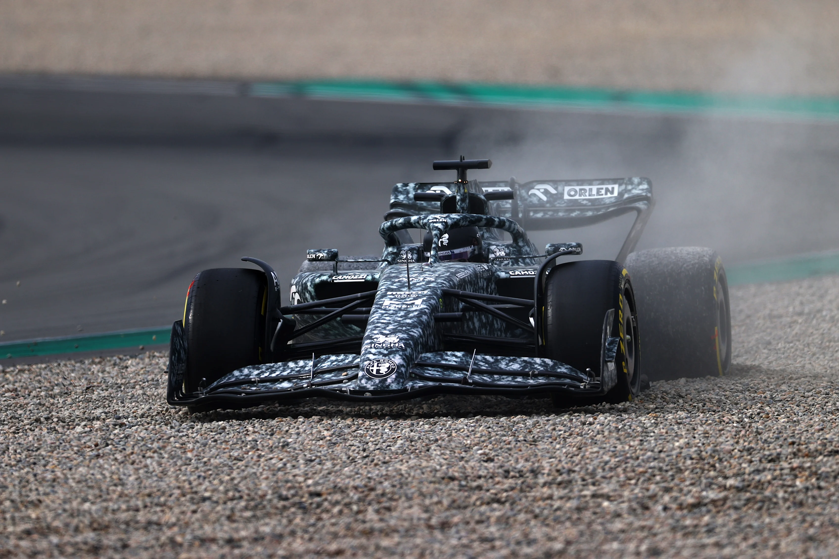 BARCELONA, SPAIN - FEBRUARY 25: Zhou Guanyu of China driving the (24) Alfa Romeo F1 C42 Ferrari