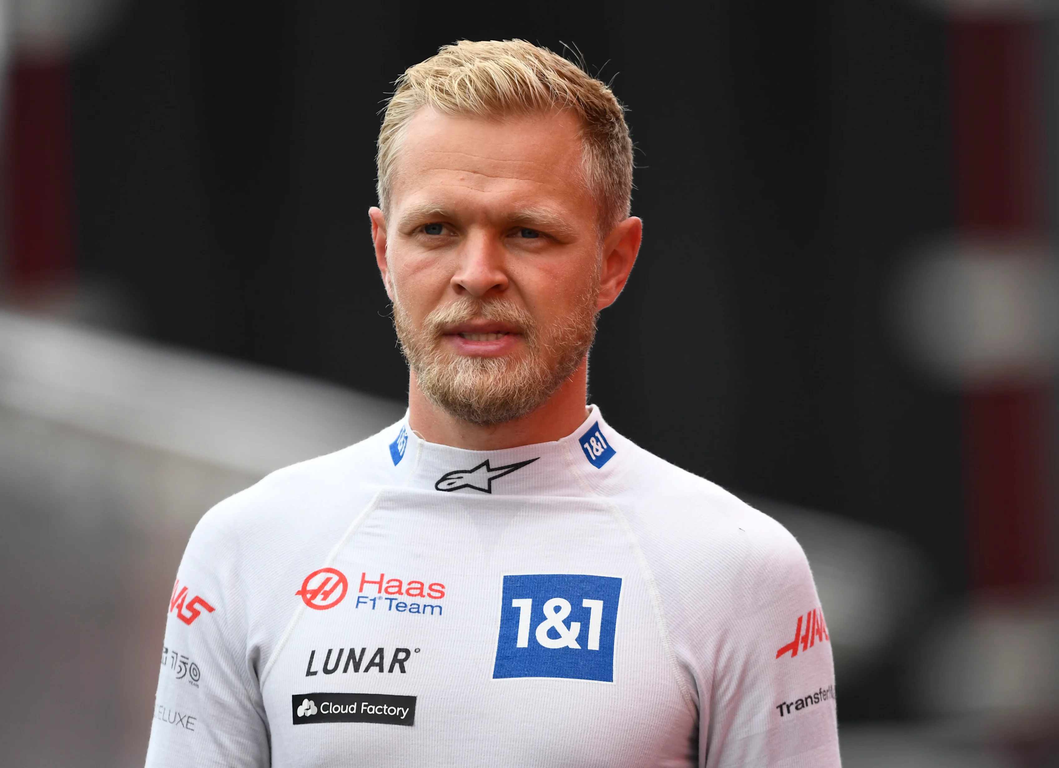 SPA, BELGIUM - AUGUST 27: 18th place qualifier Kevin Magnussen of Denmark and Haas F1 walks in the Pitlane during qualifying ahead of the F1 Grand Prix of Belgium at Circuit de Spa-Francorchamps on August 27, 2022 in Spa, Belgium. (Photo by Rudy Carezzevoli/Getty Images)