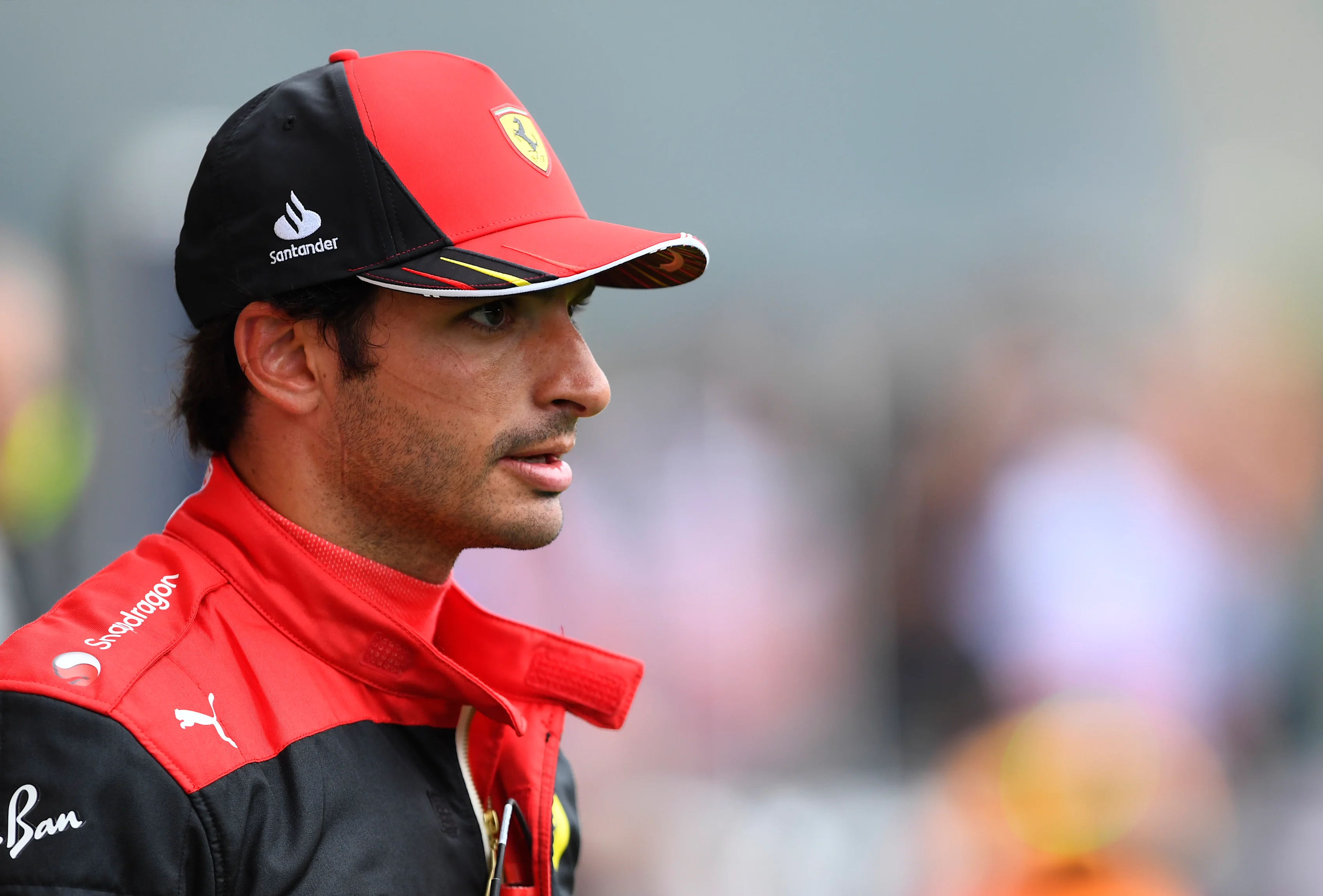 SPA, BELGIUM - AUGUST 27: Second placed qualifier Carlos Sainz of Spain and Ferrari looks on in parc ferme during qualifying ahead of the F1 Grand Prix of Belgium at Circuit de Spa-Francorchamps on August 27, 2022 in Spa, Belgium. (Photo by Rudy Carezzevoli/Getty Images)