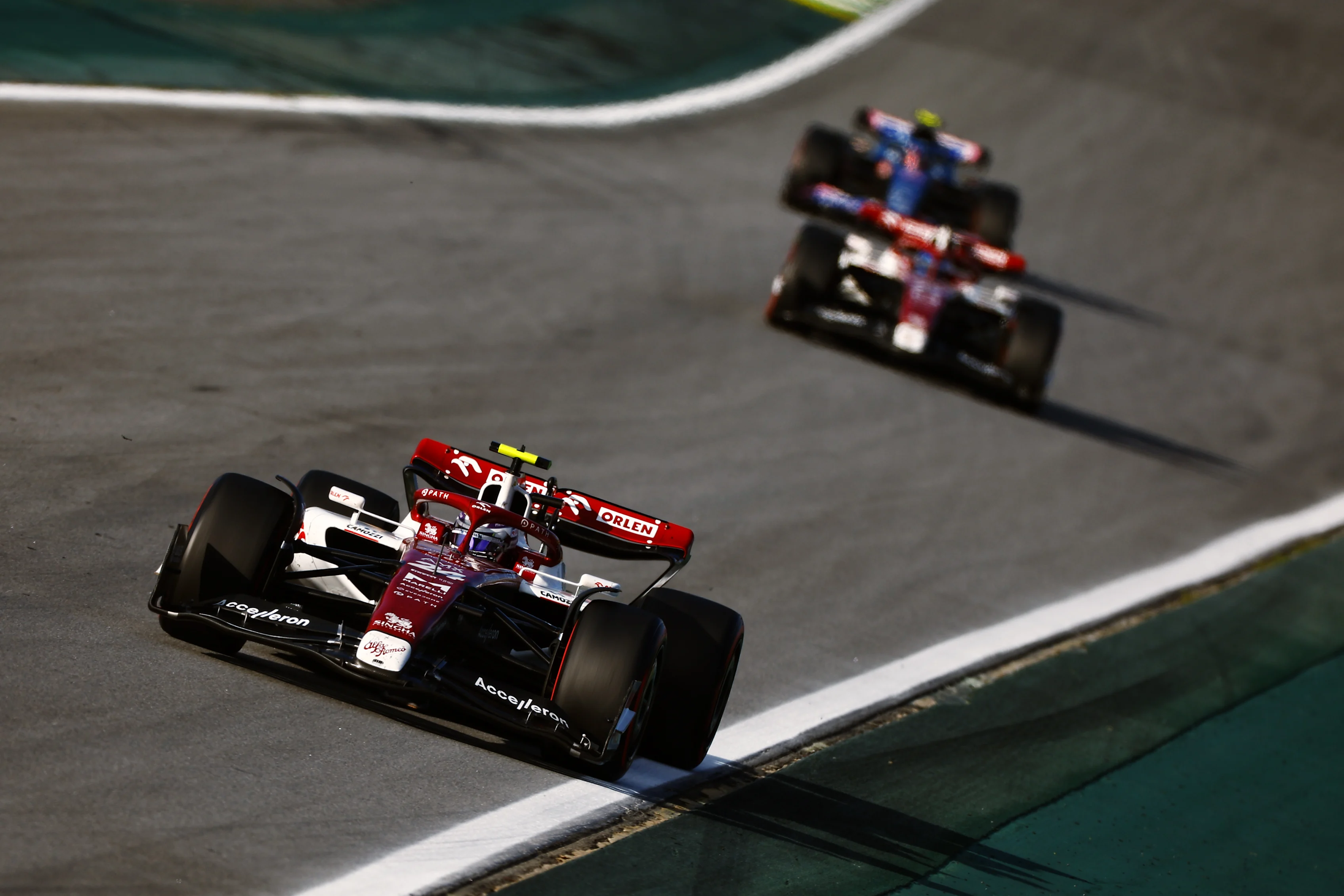 SAO PAULO, BRAZIL - NOVEMBER 12: Zhou Guanyu of China driving the (24) Alfa Romeo F1 C42 Ferrari