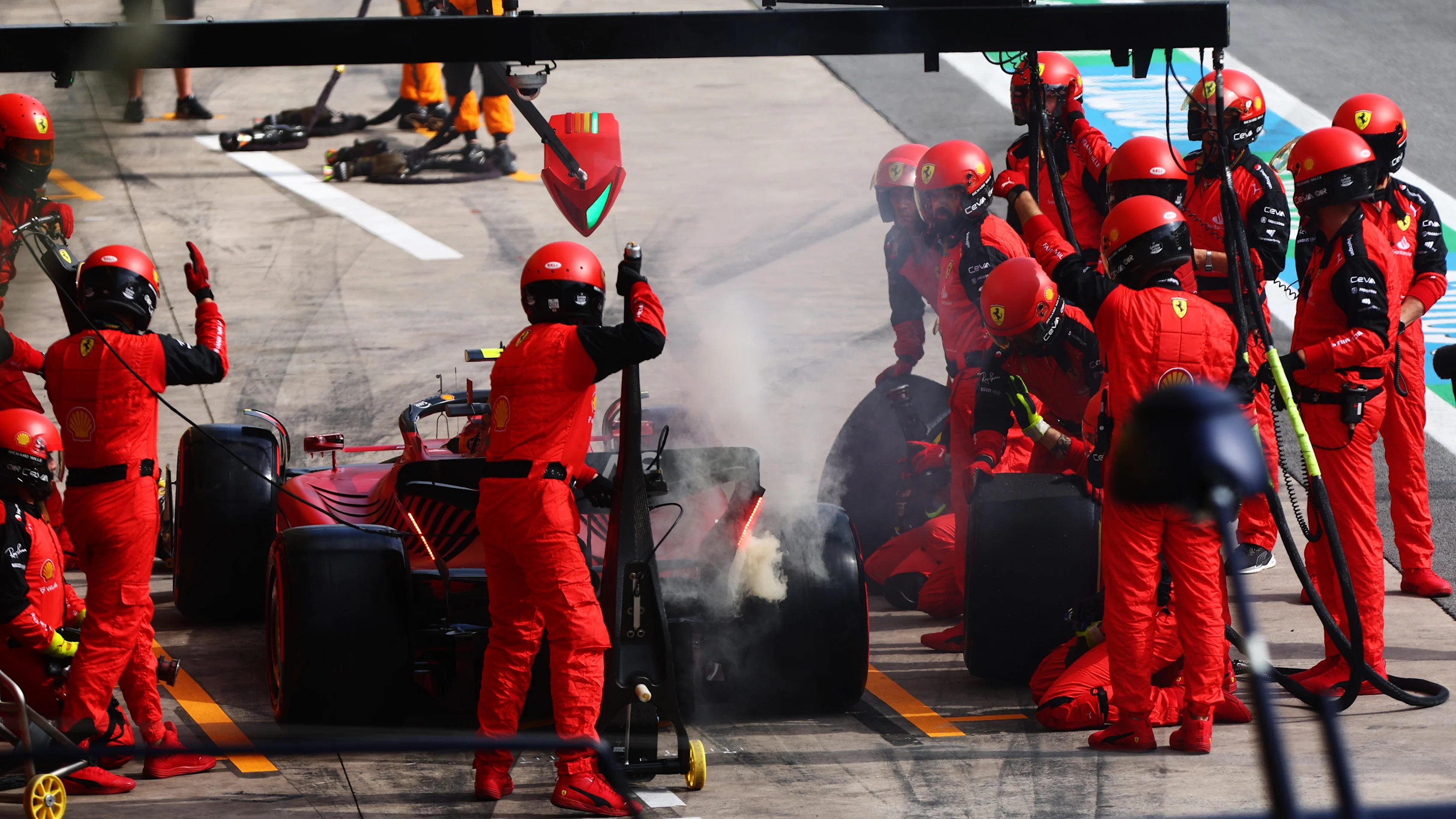 SAO PAULO, BRAZIL - NOVEMBER 13: Carlos Sainz of Spain driving (55) the Ferrari F1-75 makes a pitstop during the F1 Grand Prix of Brazil at Autodromo Jose Carlos Pace on November 13, 2022 in Sao Paulo, Brazil. (Photo by Dan Istitene - Formula 1/Formula 1 via Getty Images)