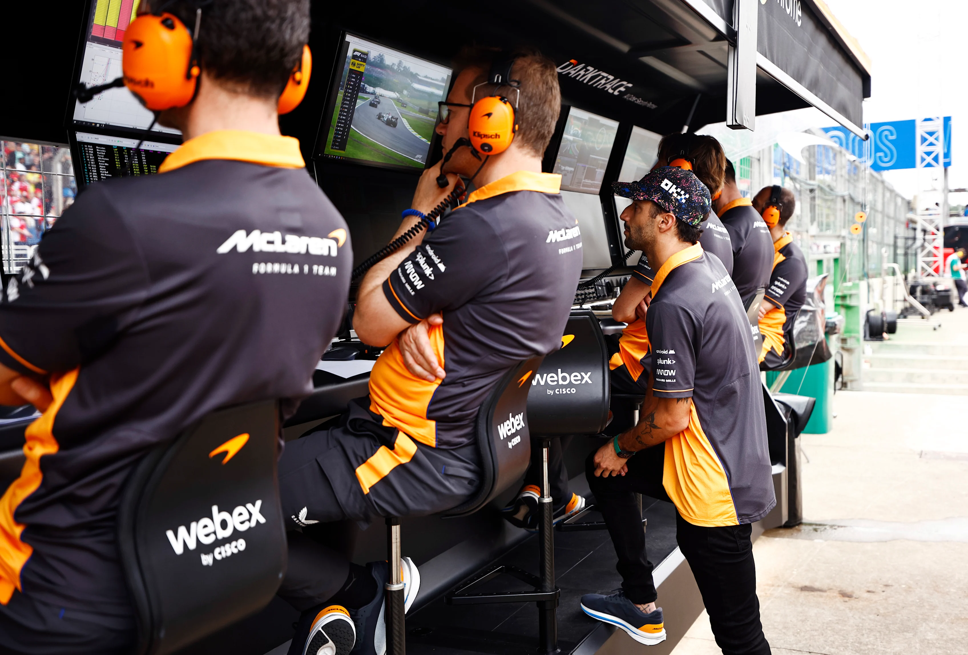 SAO PAULO, BRAZIL - NOVEMBER 13: Daniel Ricciardo of Australia and McLaren looks on from the pitwall during the F1 Grand Prix of Brazil at Autodromo Jose Carlos Pace on November 13, 2022 in Sao Paulo, Brazil. (Photo by Chris Graythen/Getty Images)