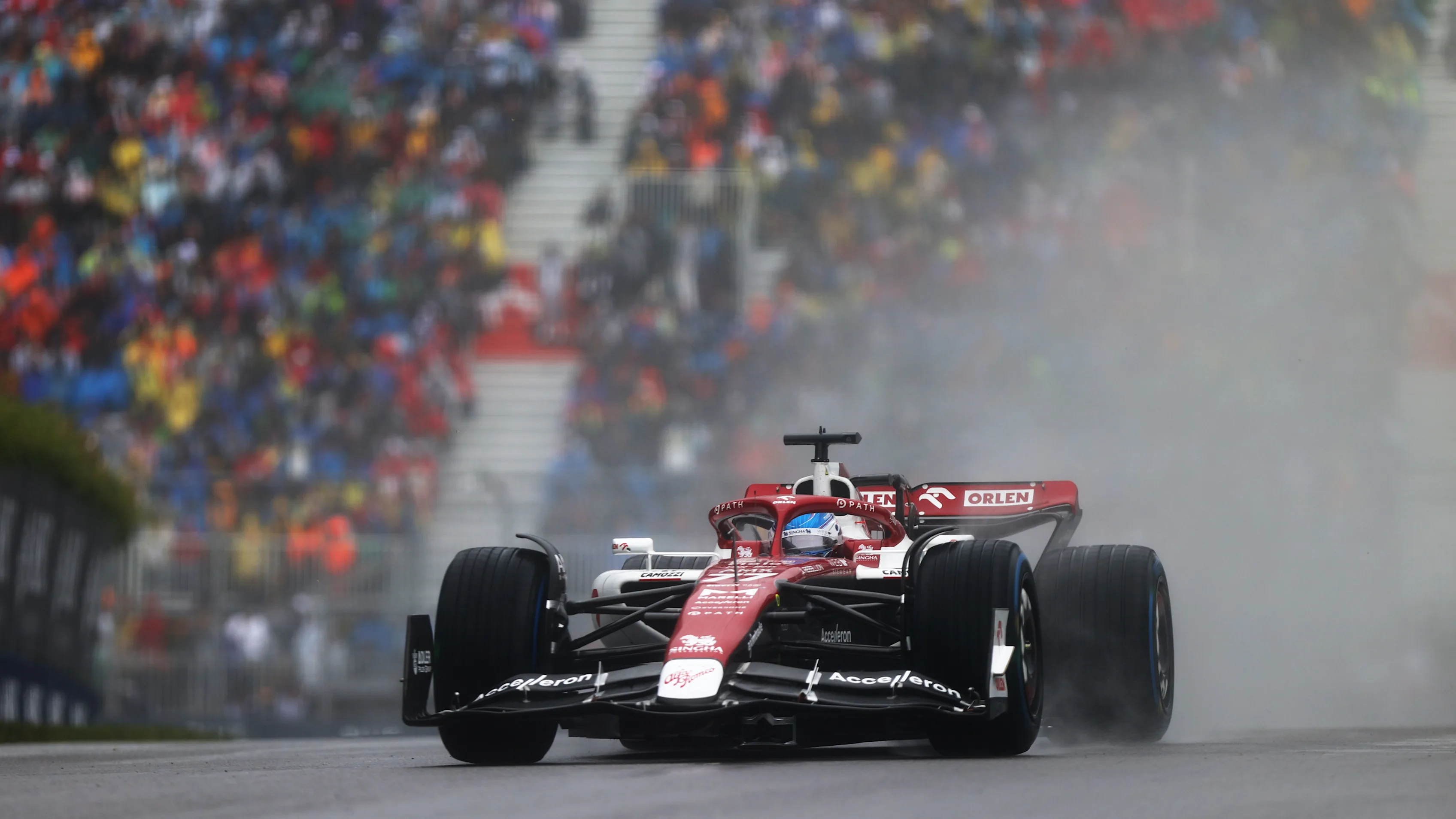 MONTREAL, QUEBEC - JUNE 18: Valtteri Bottas of Finland driving the (77) Alfa Romeo F1 C42 Ferrari in the wet during qualifying ahead of the F1 Grand Prix of Canada at Circuit Gilles Villeneuve on June 18, 2022 in Montreal, Quebec. (Photo by Dan Istitene - Formula 1/Formula 1 via Getty Images)