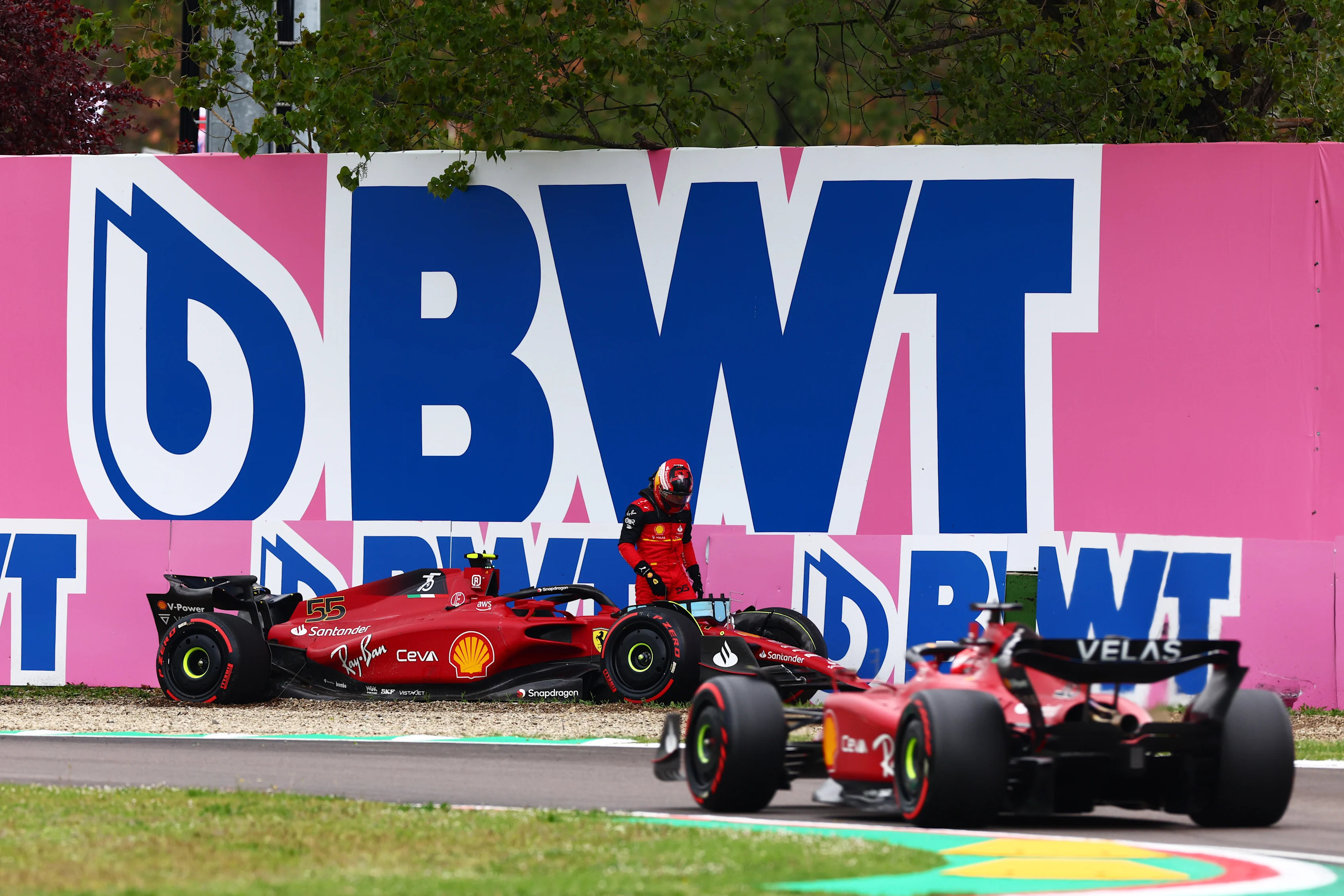 IMOLA, ITALY - APRIL 22: Carlos Sainz of Spain and Ferrari looks on after crashing his car as