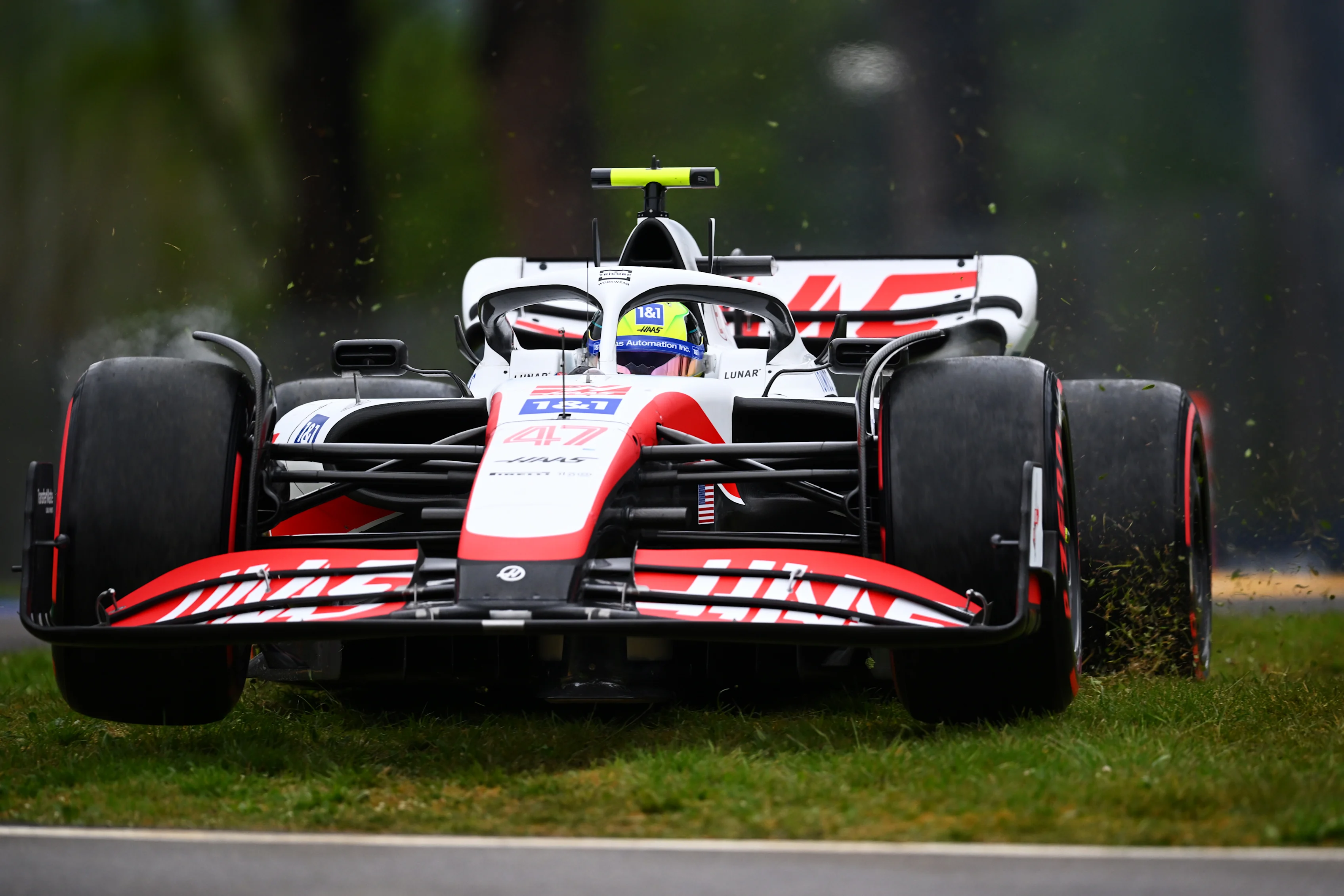 IMOLA, ITALY - APRIL 22: Mick Schumacher of Germany driving the (47) Haas F1 VF-22 Ferrari runs wide during qualifying ahead of the F1 Grand Prix of Emilia Romagna at Autodromo Enzo e Dino Ferrari on April 22, 2022 in Imola, Italy. (Photo by Clive Mason/Getty Images)