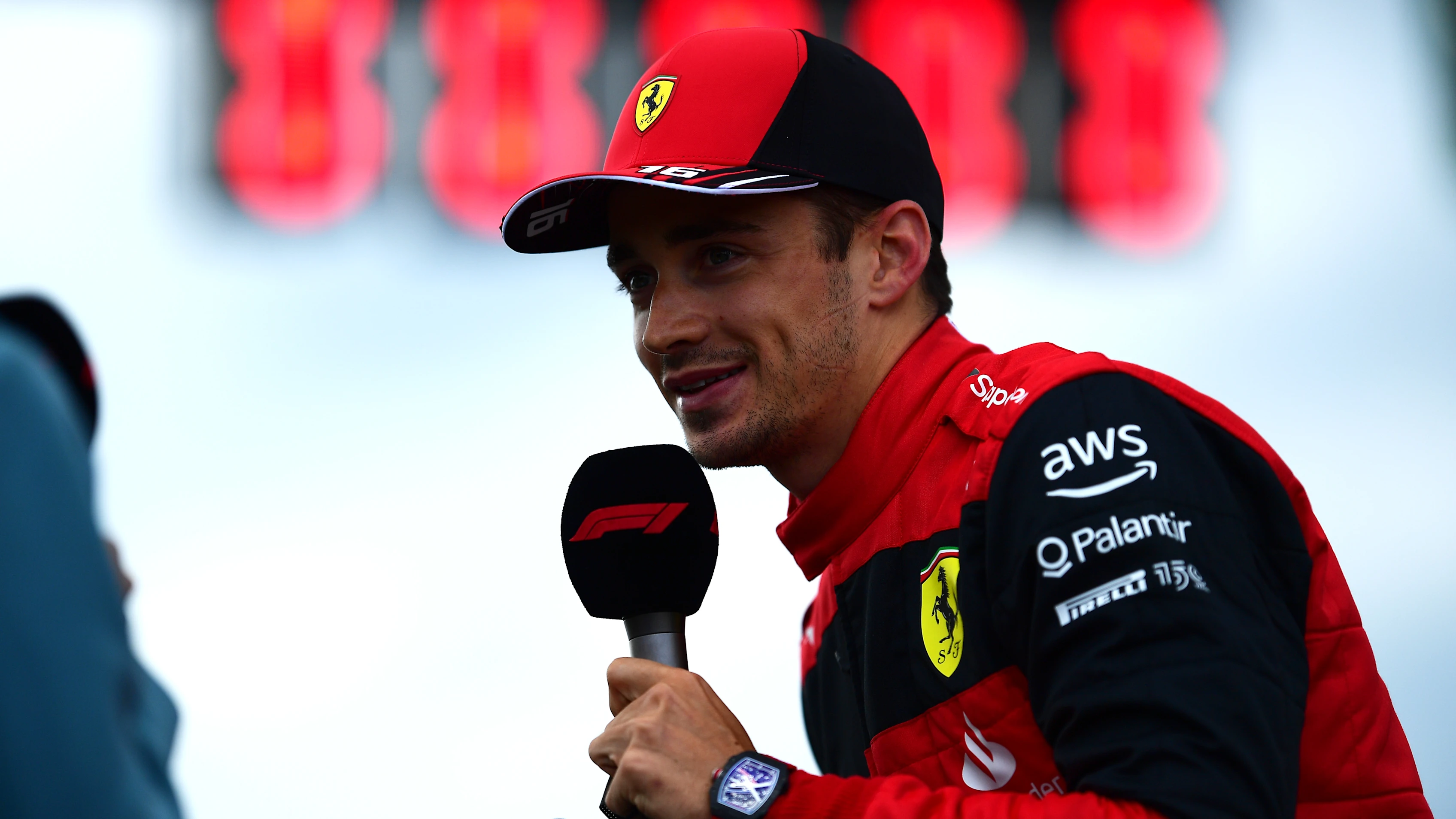 IMOLA, ITALY - APRIL 23: Charles Leclerc of Monaco and Ferrari talks to the media on the grid during Sprint ahead of the F1 Grand Prix of Emilia Romagna at Autodromo Enzo e Dino Ferrari on April 23, 2022 in Imola, Italy. (Photo by Mario Renzi - Formula 1/Formula 1 via Getty Images)