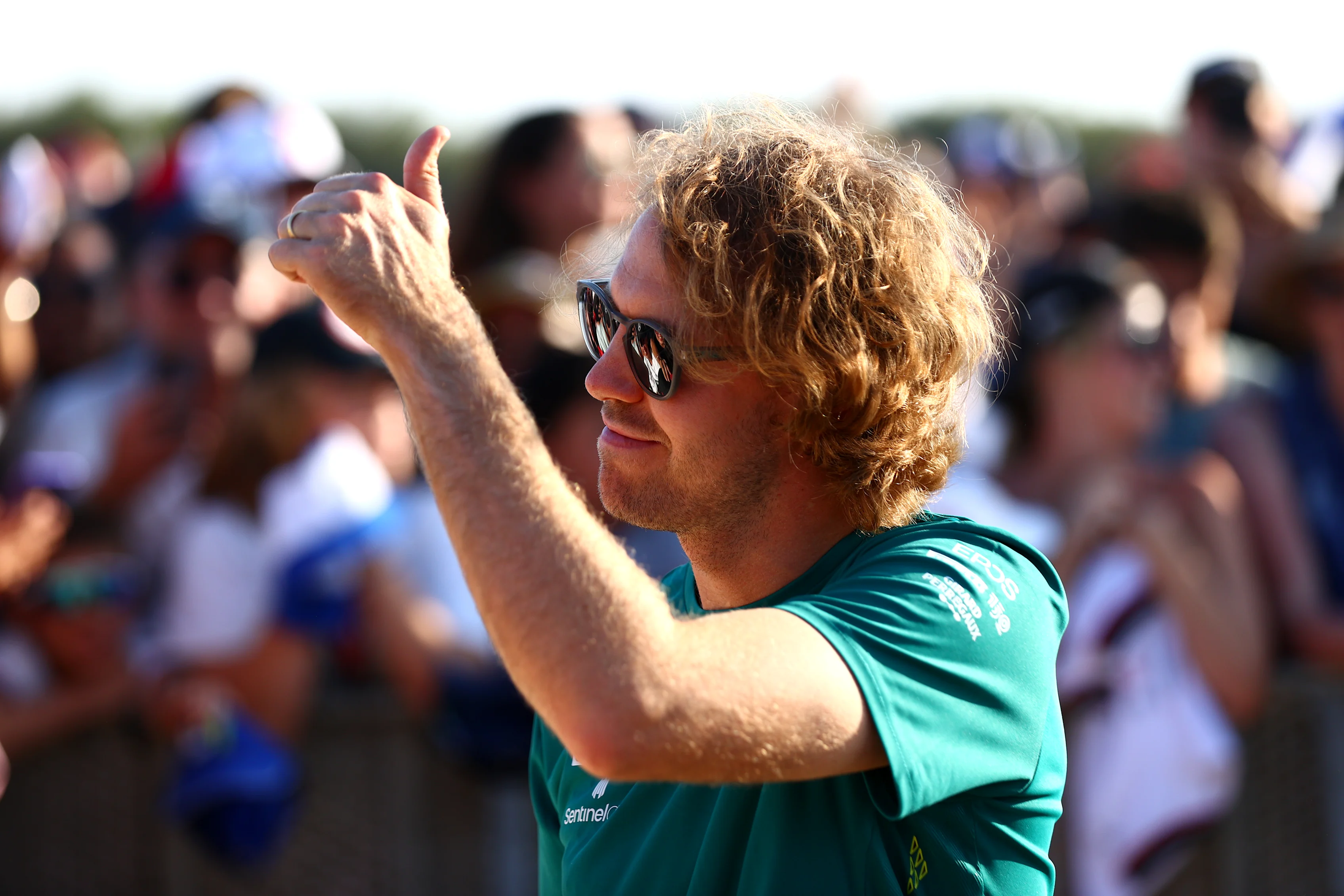 LE CASTELLET, FRANCE - JULY 23: Sebastian Vettel of Germany and Aston Martin F1 Team greets fans