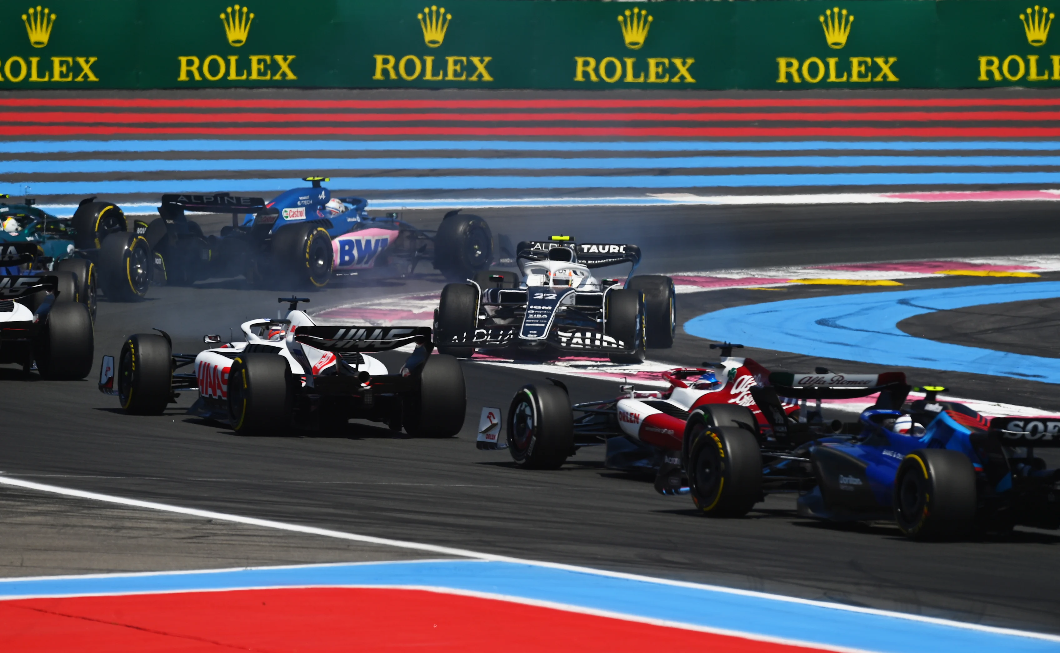 LE CASTELLET, FRANCE - JULY 24: Yuki Tsunoda of Japan driving the (22) Scuderia AlphaTauri AT03 is passed after spinning during the F1 Grand Prix of France at Circuit Paul Ricard on July 24, 2022 in Le Castellet, France. (Photo by Dan Mullan/Getty Images)