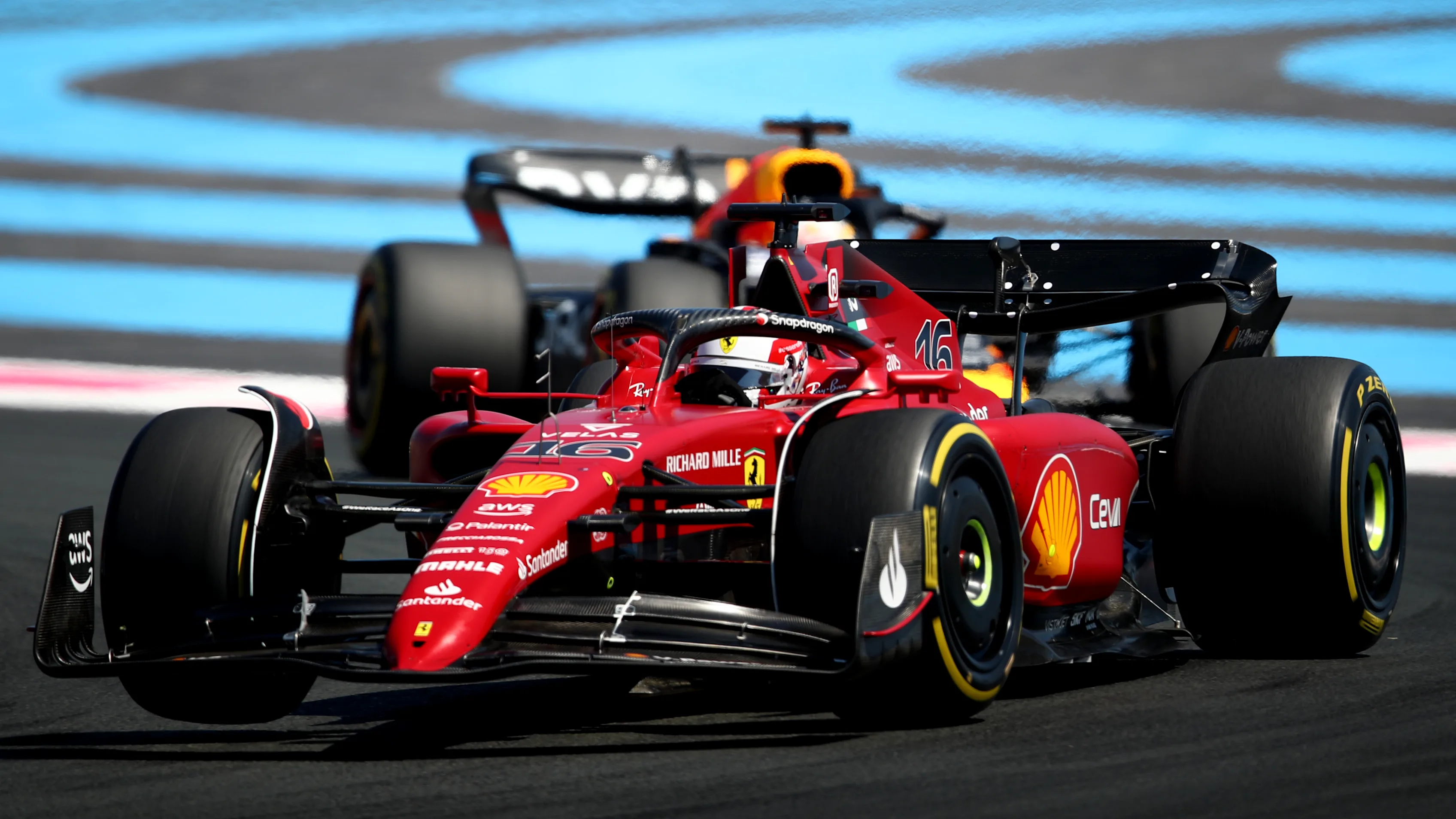 LE CASTELLET, FRANCE - JULY 24: Charles Leclerc of Monaco driving the (16) Ferrari F1-75 leads Max Verstappen of the Netherlands driving the (1) Oracle Red Bull Racing RB18 during the F1 Grand Prix of France at Circuit Paul Ricard on July 24, 2022 in Le Castellet, France. (Photo by Joe Portlock - Formula 1/Formula 1 via Getty Images)