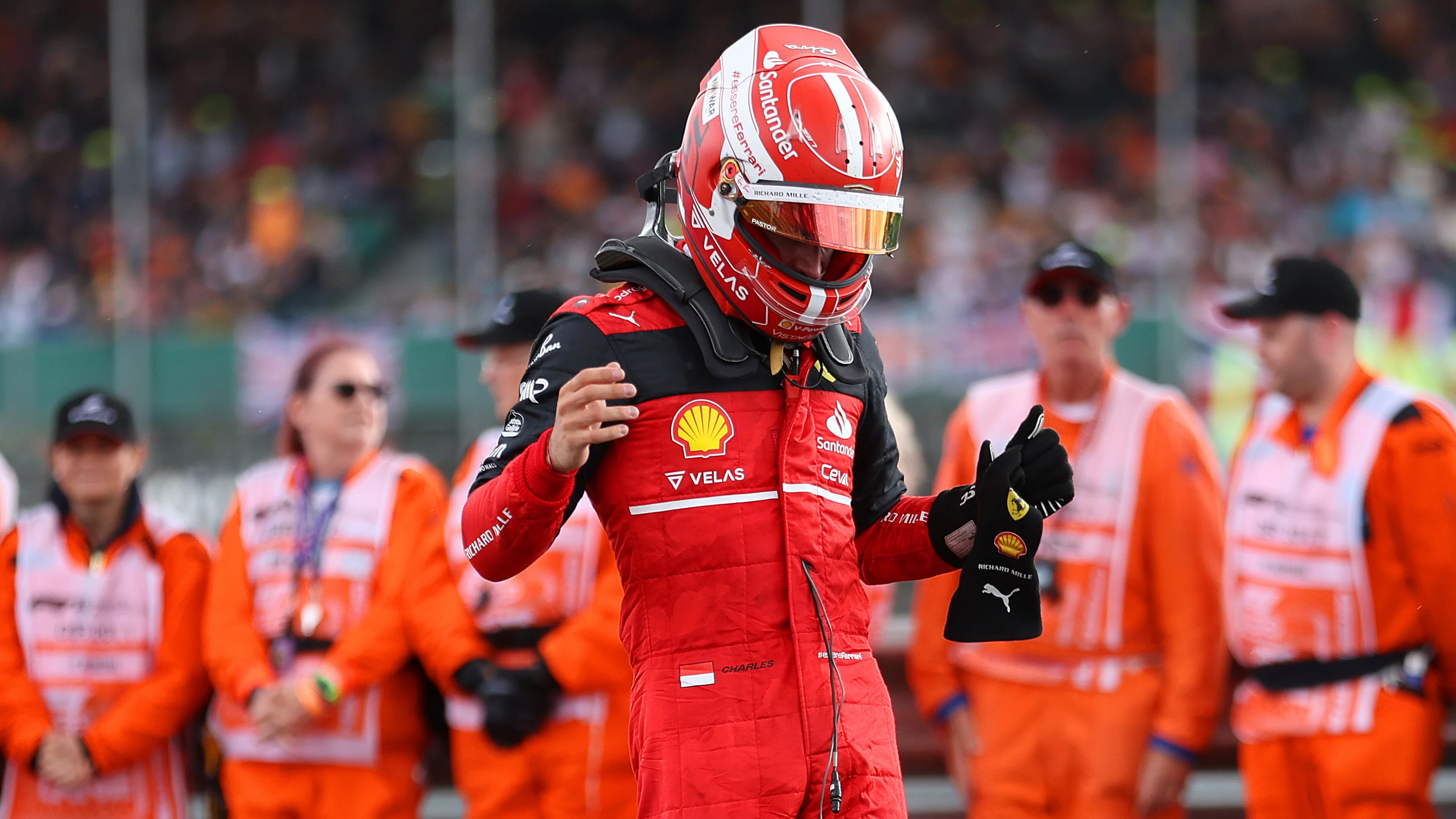 NORTHAMPTON, ENGLAND - JULY 03: Charles Leclerc of Monaco and Ferrari reacts in parc ferme after
