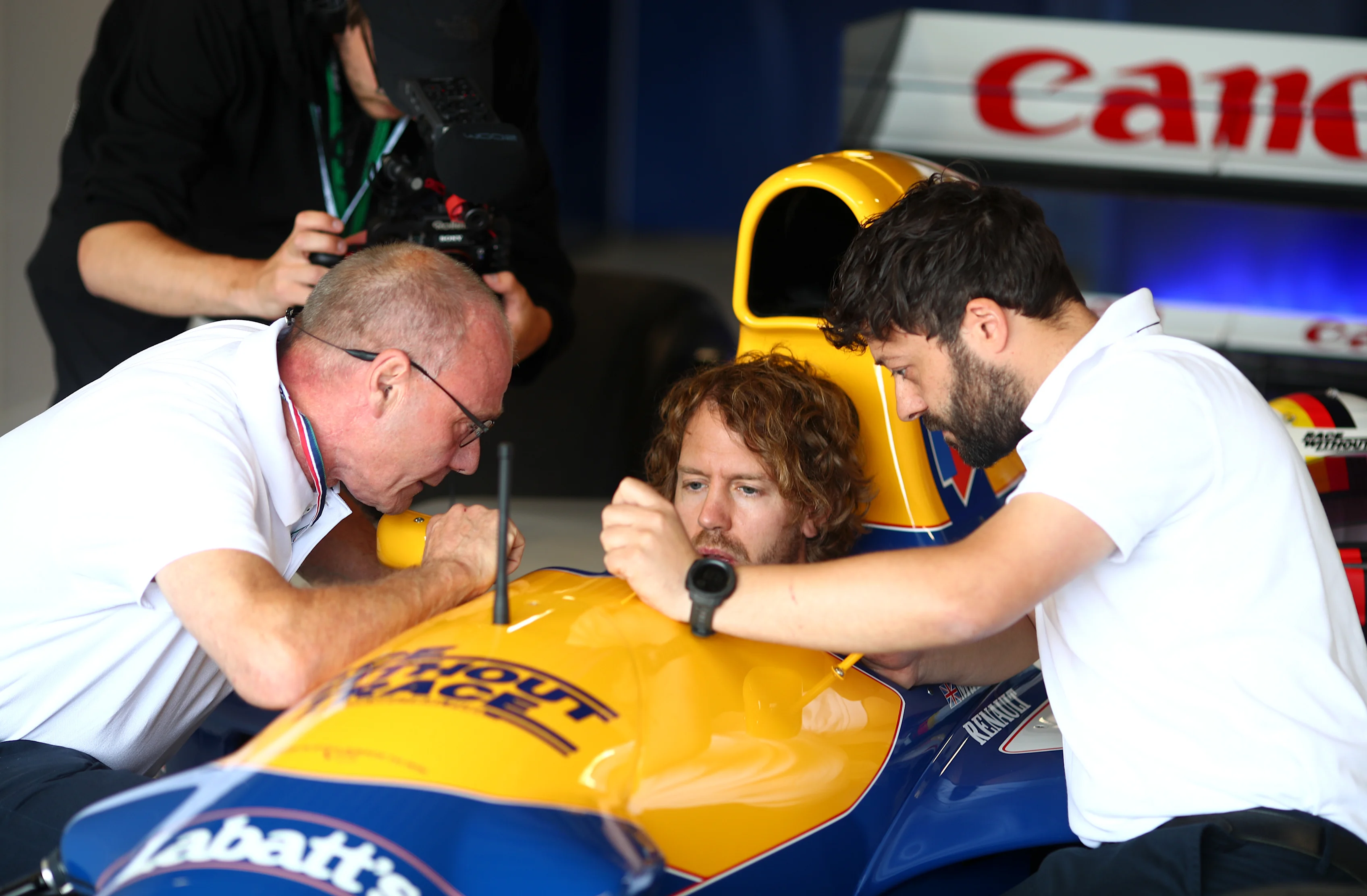 NORTHAMPTON, ENGLAND - JUNE 30: Sebastian Vettel of Germany and Aston Martin F1 Team looks on as he