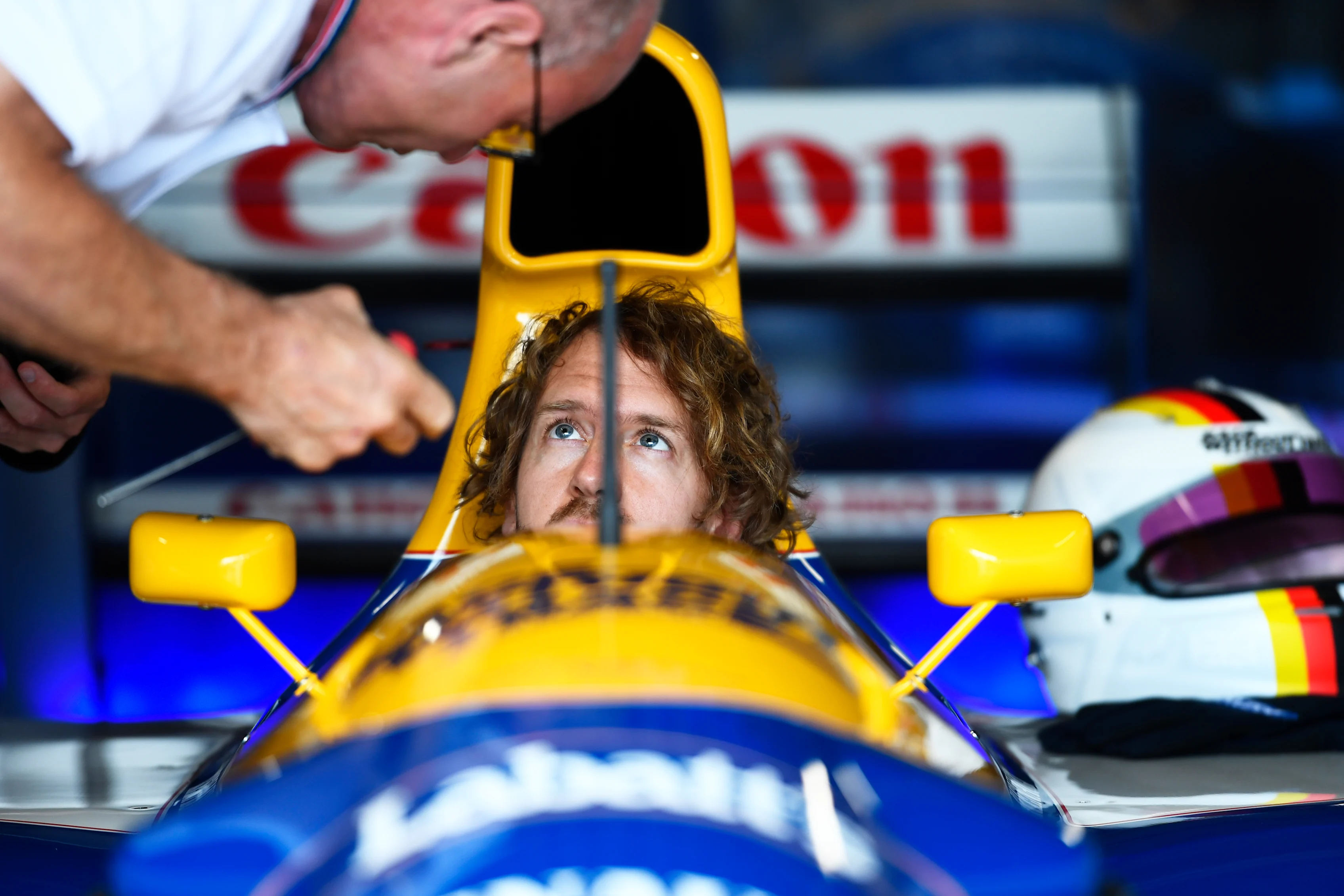 NORTHAMPTON, ENGLAND - JUNE 30: Sebastian Vettel of Germany and Aston Martin F1 Team looks on as he