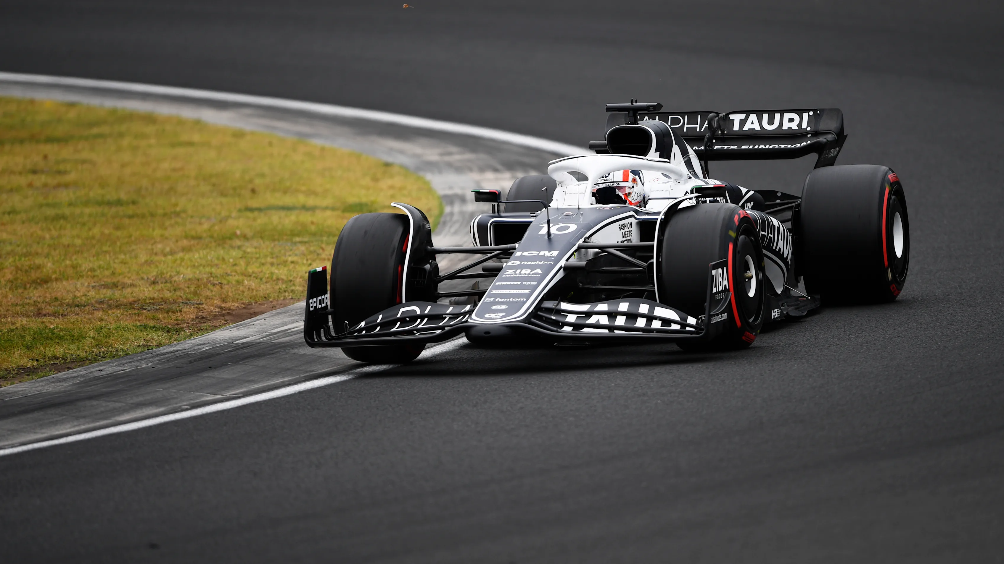 BUDAPEST, HUNGARY - JULY 31: Pierre Gasly of France driving the (10) Scuderia AlphaTauri AT03 on
