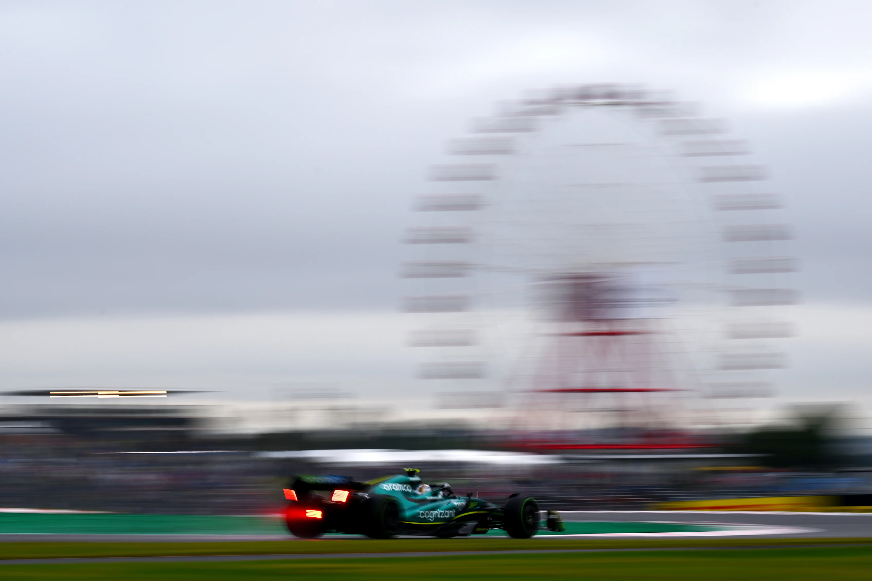 SUZUKA, JAPAN - OCTOBER 07: Sebastian Vettel of Germany driving the (5) Aston Martin AMR22 Mercedes