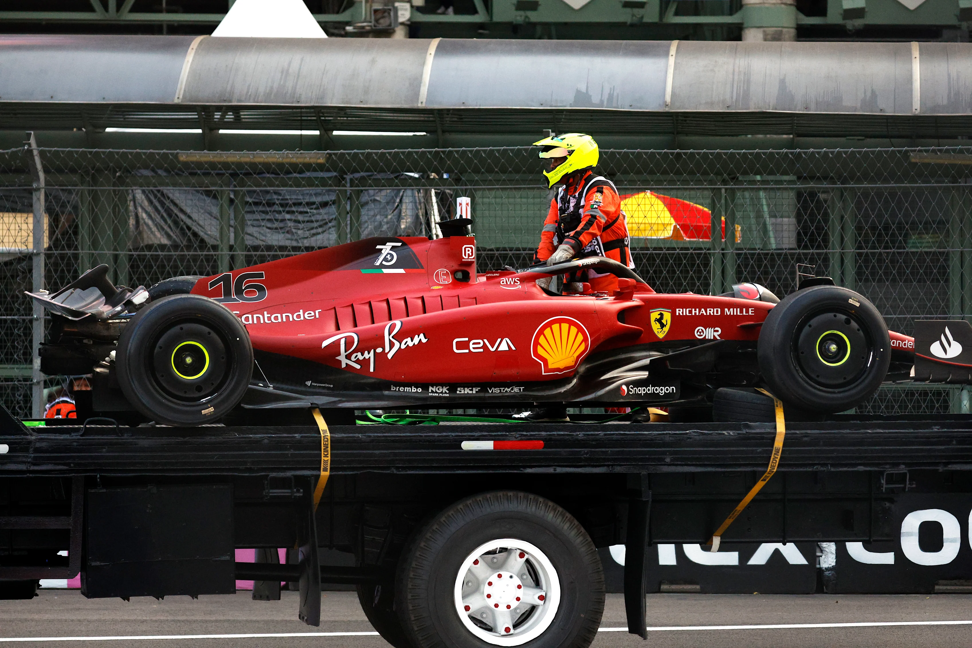 MEXICO CITY, MEXICO - OCTOBER 28: The car of Charles Leclerc of Monaco and Ferrari is brought back to the pitlane after a crash during practice ahead of the F1 Grand Prix of Mexico at Autodromo Hermanos Rodriguez on October 28, 2022 in Mexico City, Mexico. (Photo by Chris Graythen/Getty Images)
