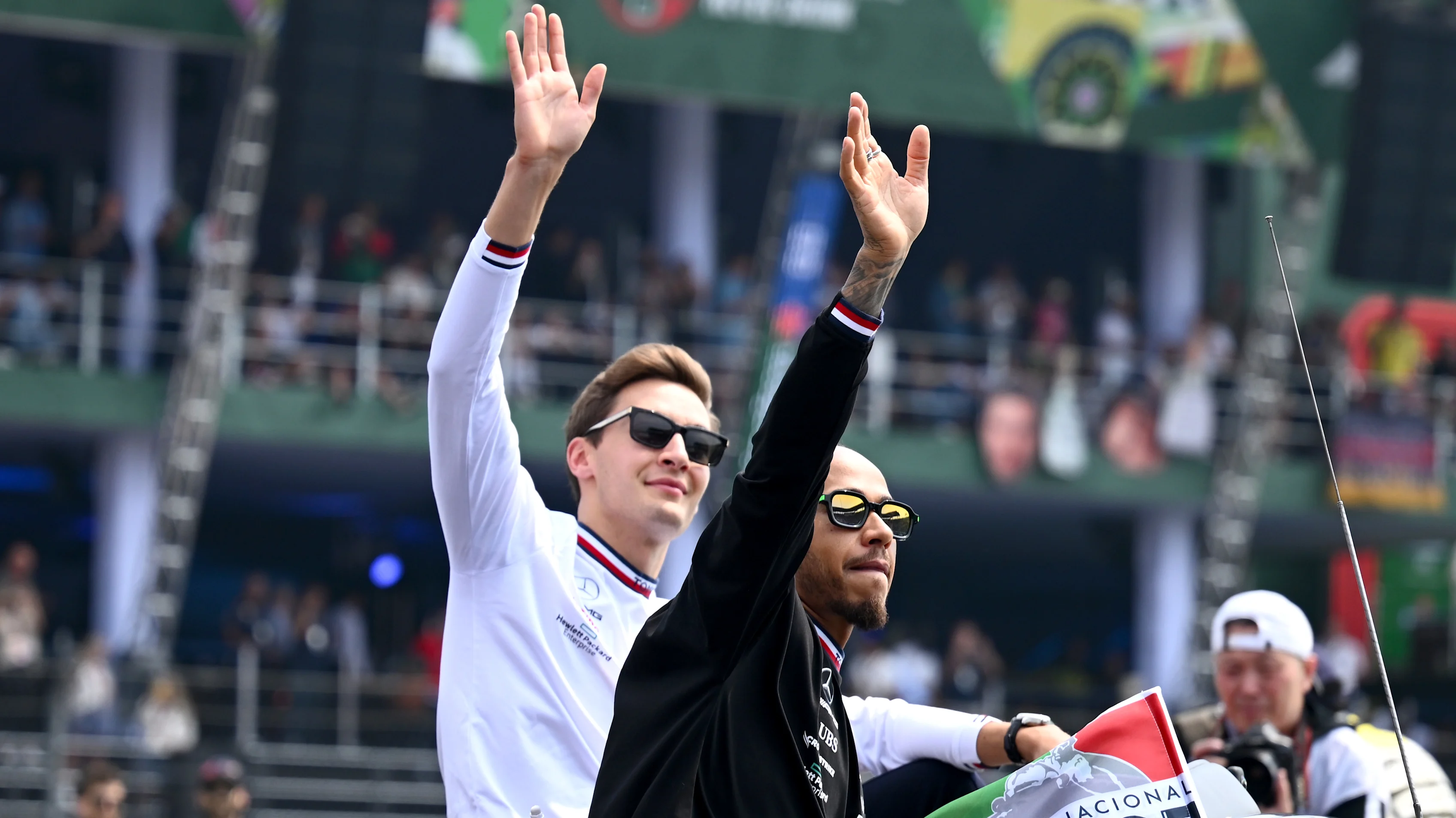 MEXICO CITY, MEXICO - OCTOBER 30: Lewis Hamilton of Great Britain and Mercedes and George Russell