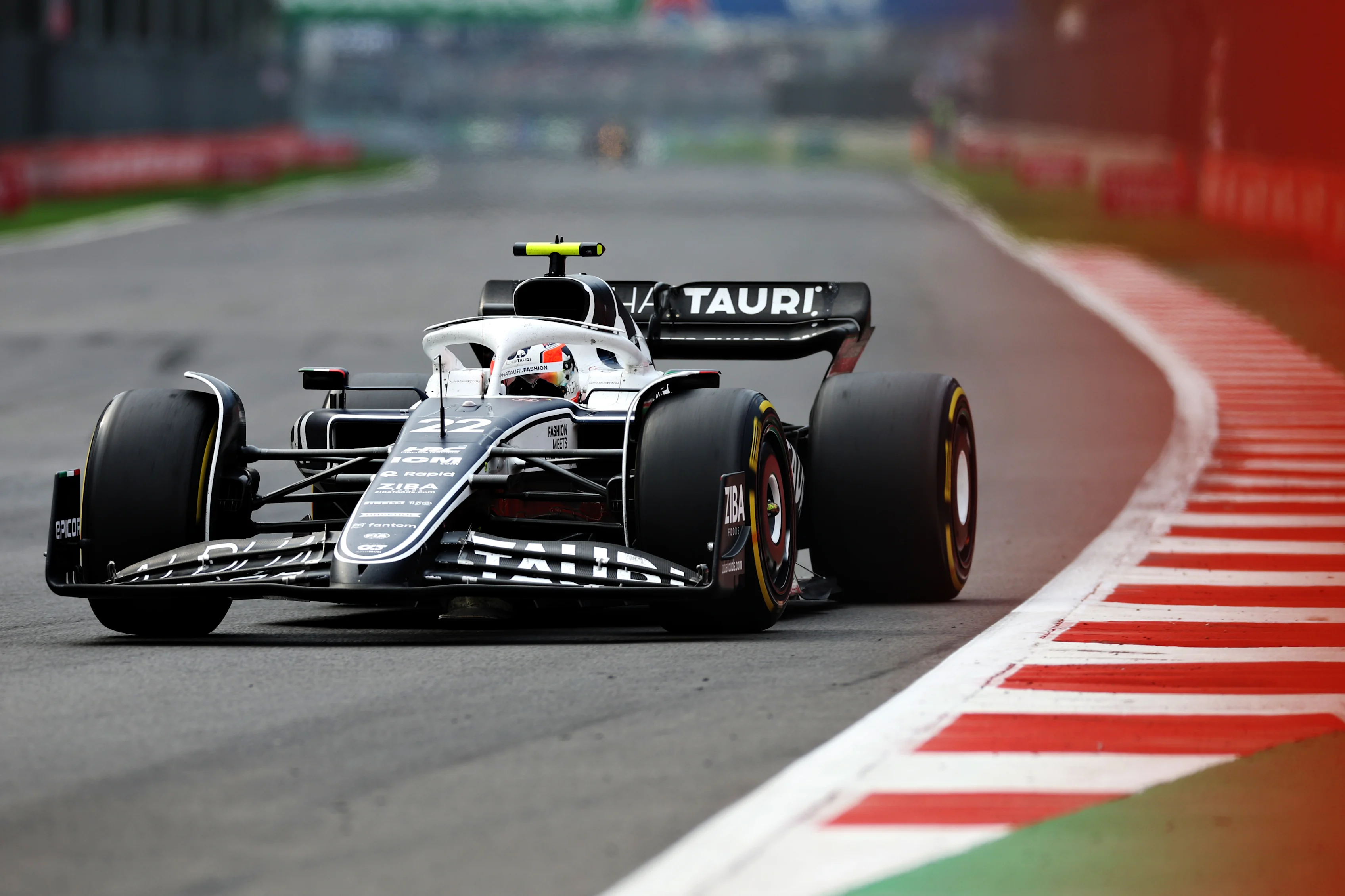 MEXICO CITY, MEXICO - OCTOBER 30: Yuki Tsunoda of Japan driving the (22) Scuderia AlphaTauri AT03 on track during the F1 Grand Prix of Mexico at Autodromo Hermanos Rodriguez on October 30, 2022 in Mexico City, Mexico. (Photo by Peter Fox/Getty Images )