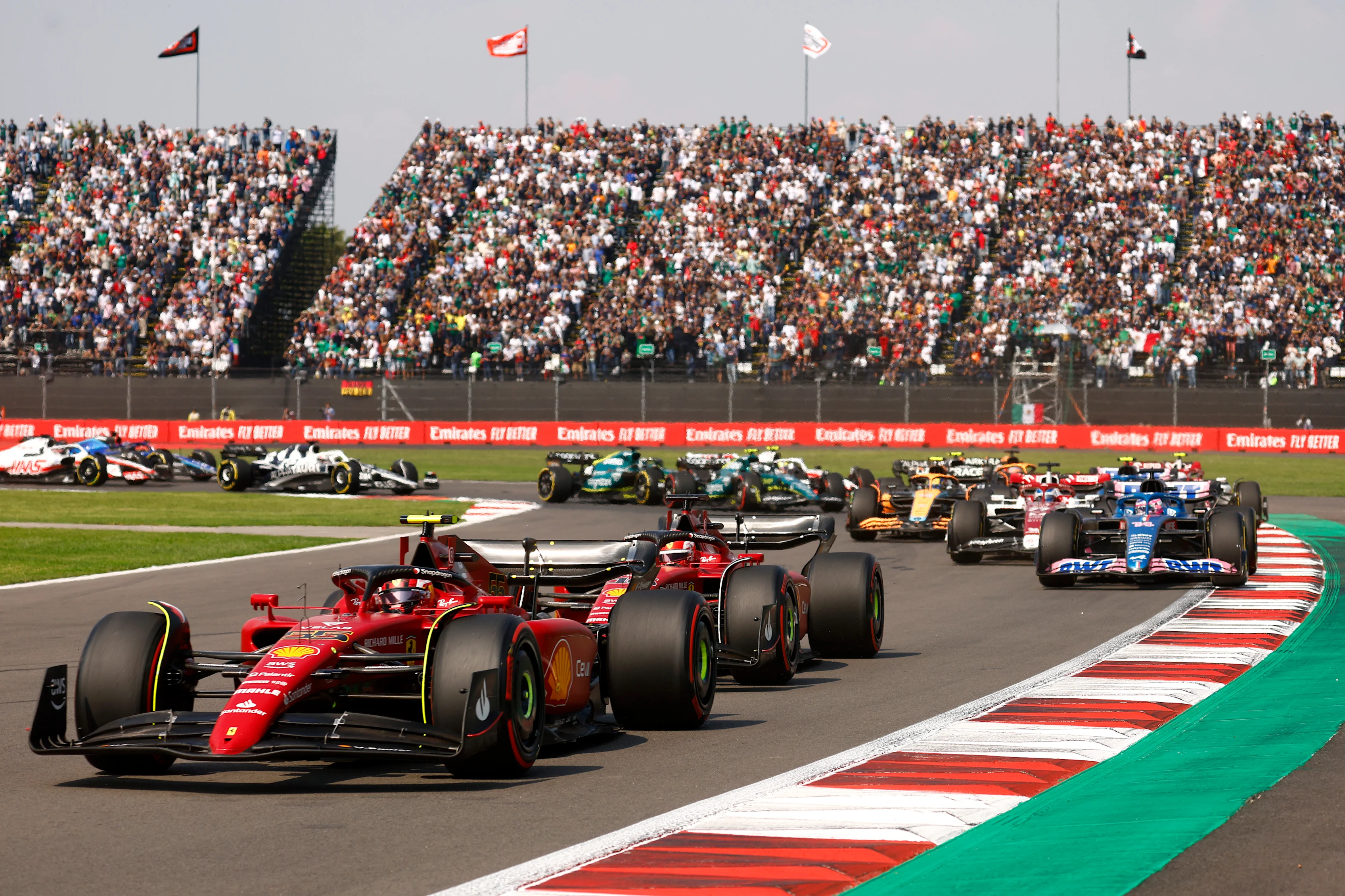 MEXICO CITY, MEXICO - OCTOBER 30: Carlos Sainz of Spain driving (55) the Ferrari F1-75 leads