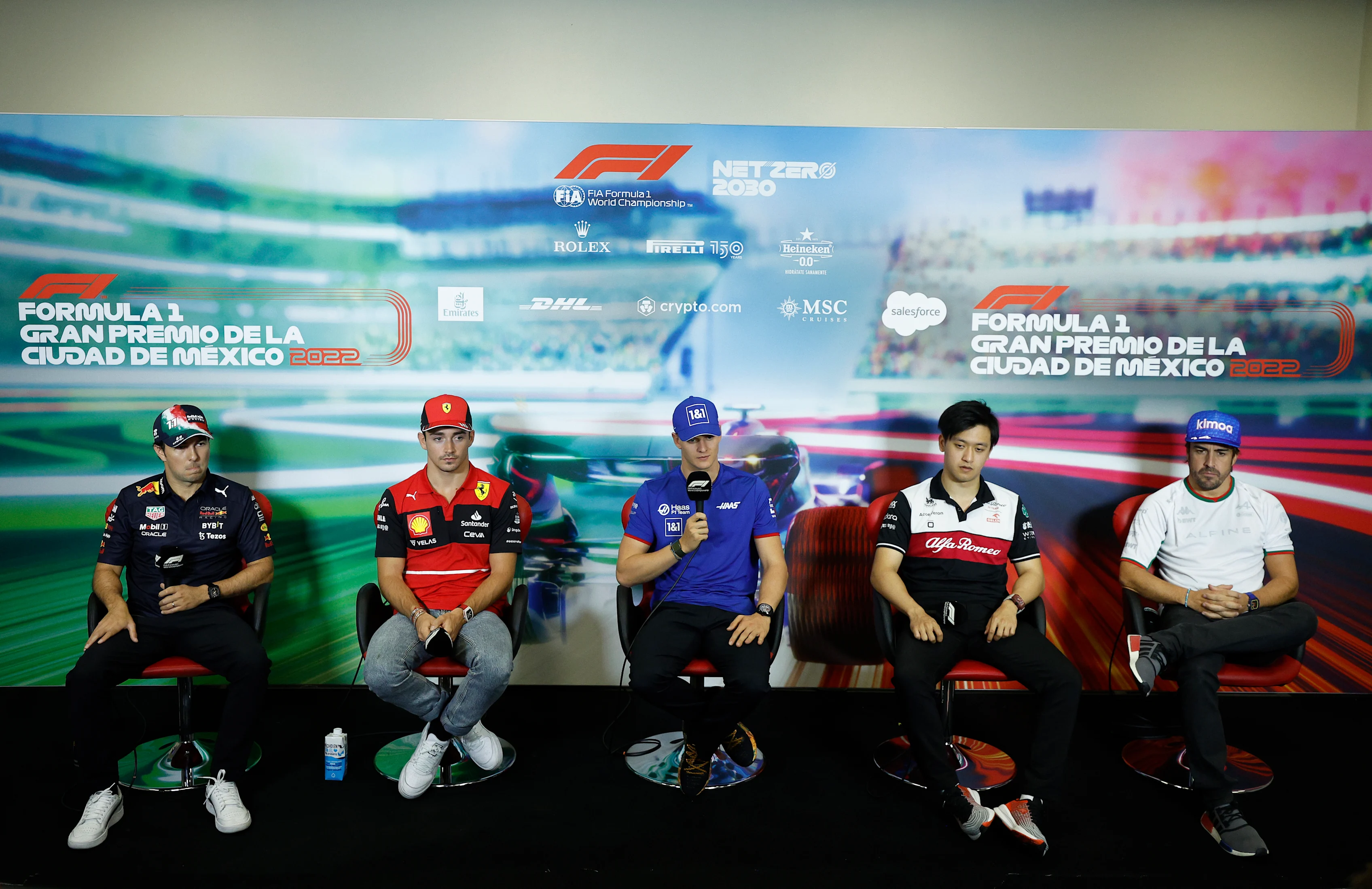 MEXICO CITY, MEXICO - OCTOBER 27: (L-R) Sergio Perez of Mexico and Oracle Red Bull Racing, Charles Leclerc of Monaco and Ferrari, Mick Schumacher of Germany and Haas F1, Zhou Guanyu of China and Alfa Romeo F1 and Fernando Alonso of Spain and Alpine F1 attend the Drivers Press Conference  during previews ahead of the F1 Grand Prix of Mexico at Autodromo Hermanos Rodriguez on October 27, 2022 in Mexico City, Mexico. (Photo by Jared C. Tilton/Getty Images)